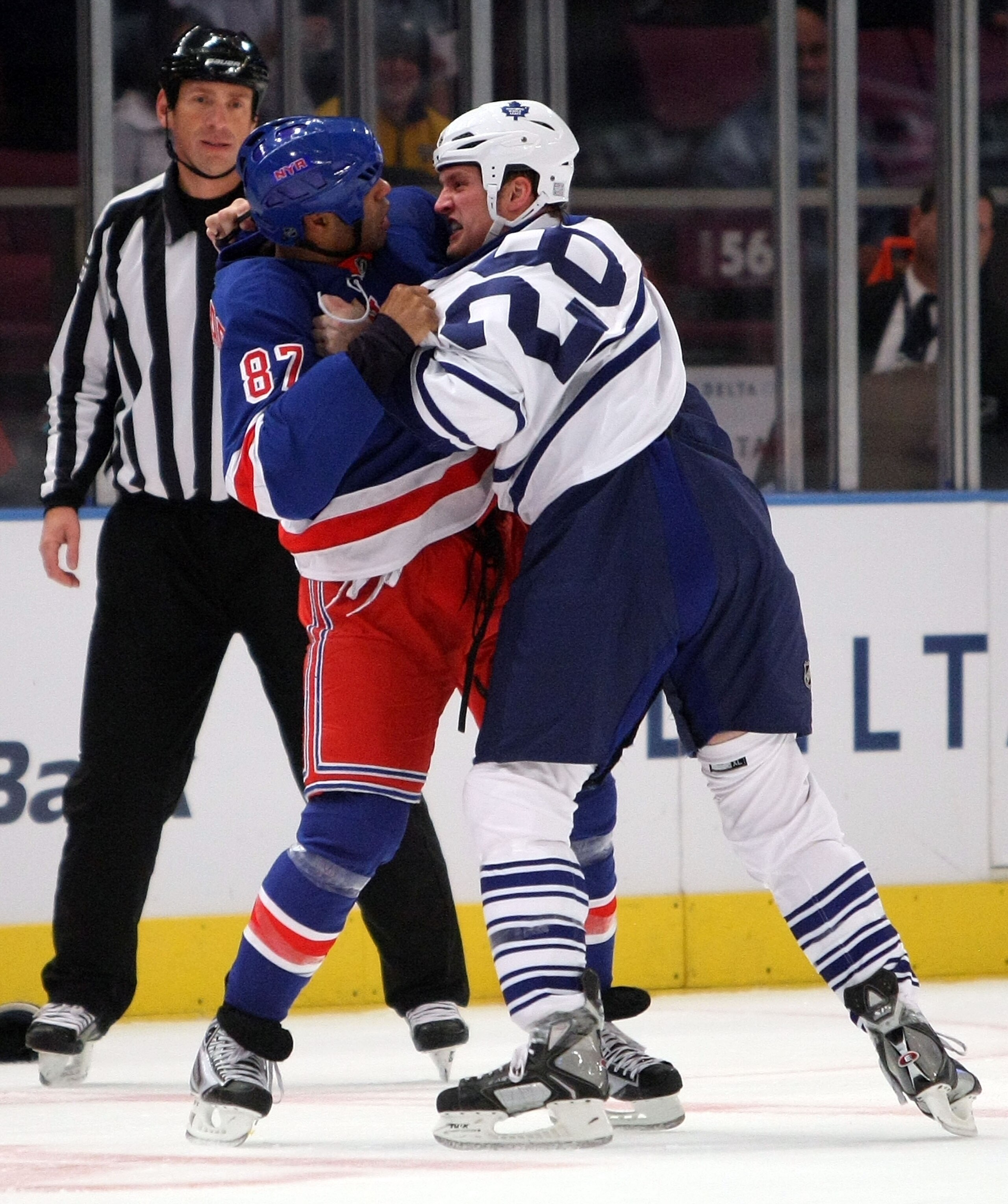 NEW YORK - OCTOBER 12: Donald Brashear #87 of the New York Rangers fights with Colton Orr #28 of the Toronto Maple Leafs during their game at Madison Square Garden on October 12, 2009 in New York City.  (Photo by Nick Laham/Getty Images)