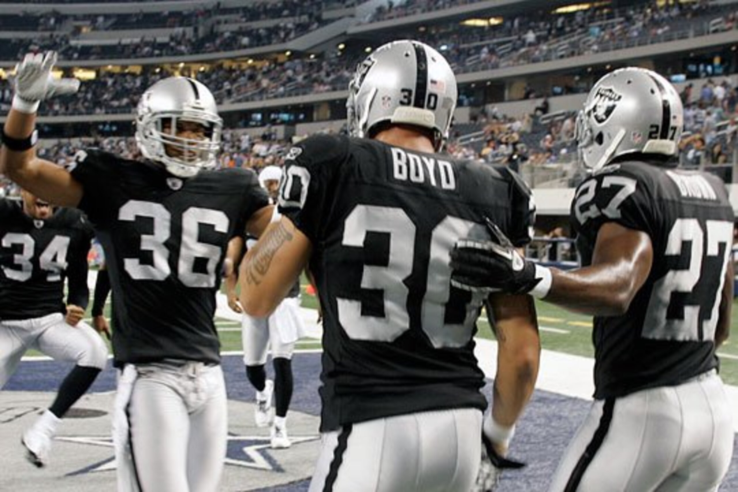 Jerome Boyd celebrates his game clinching TD with teammates