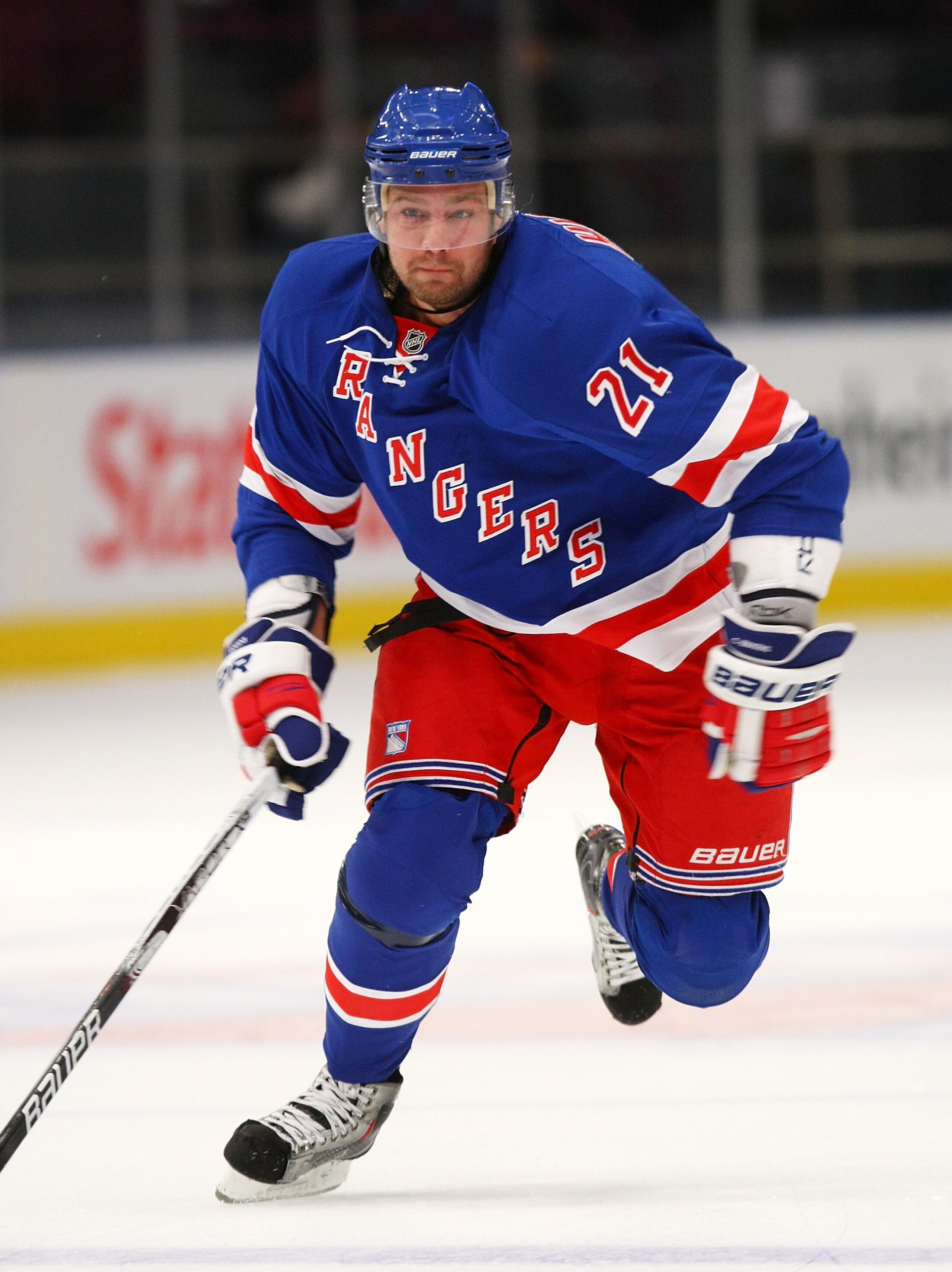 NEW YORK - OCTOBER 14:  Chris Higgins #21 of the New York Rangers skates against the Los Angeles Kings at Madison Square Garden on October 14, 2009 in New York, New York.  (Photo by Bruce Bennett/Getty Images)
