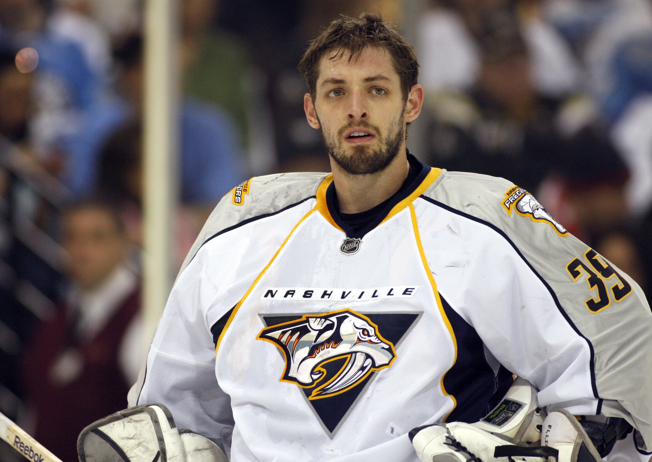 PITTSBURGH - FEBRUARY 14:  Dan Ellis #39 of the Nashville Predators takes a break during a TV timeout against the Pittsburgh Penguins at Mellon Arena on February 14, 2010 in Pittsburgh, Pennsylvania.  The Predators defeated the Penguins 4-3 in shootout ov