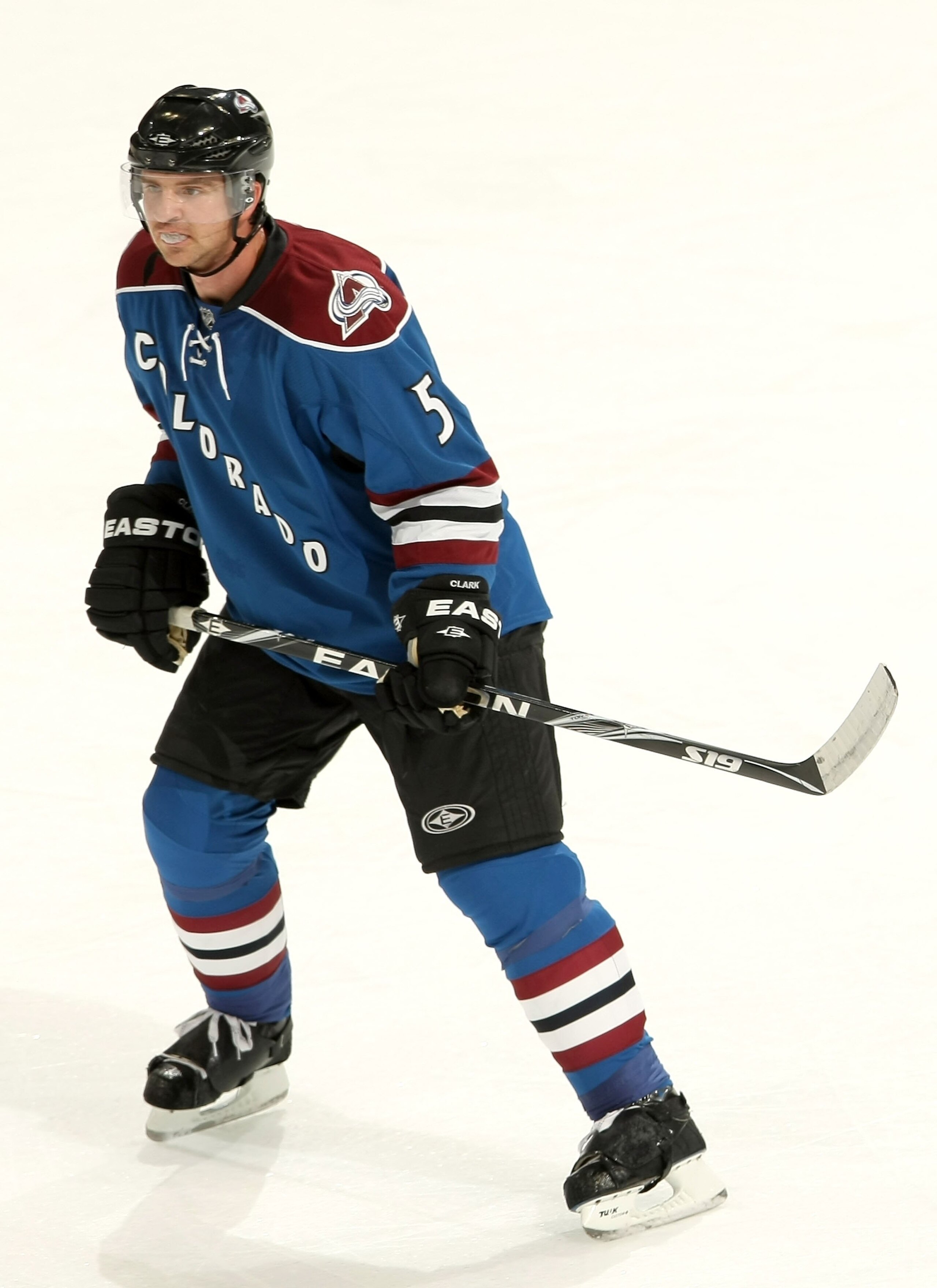 DENVER - NOVEMBER 25:  Brett Clark #5 of the Colorado Avalanche looks on during the game against the Nashville Predators at the Pepsi Center on November 25, 2009 in Denver, Colorado. (Photo by Doug Pensinger/Getty Images)