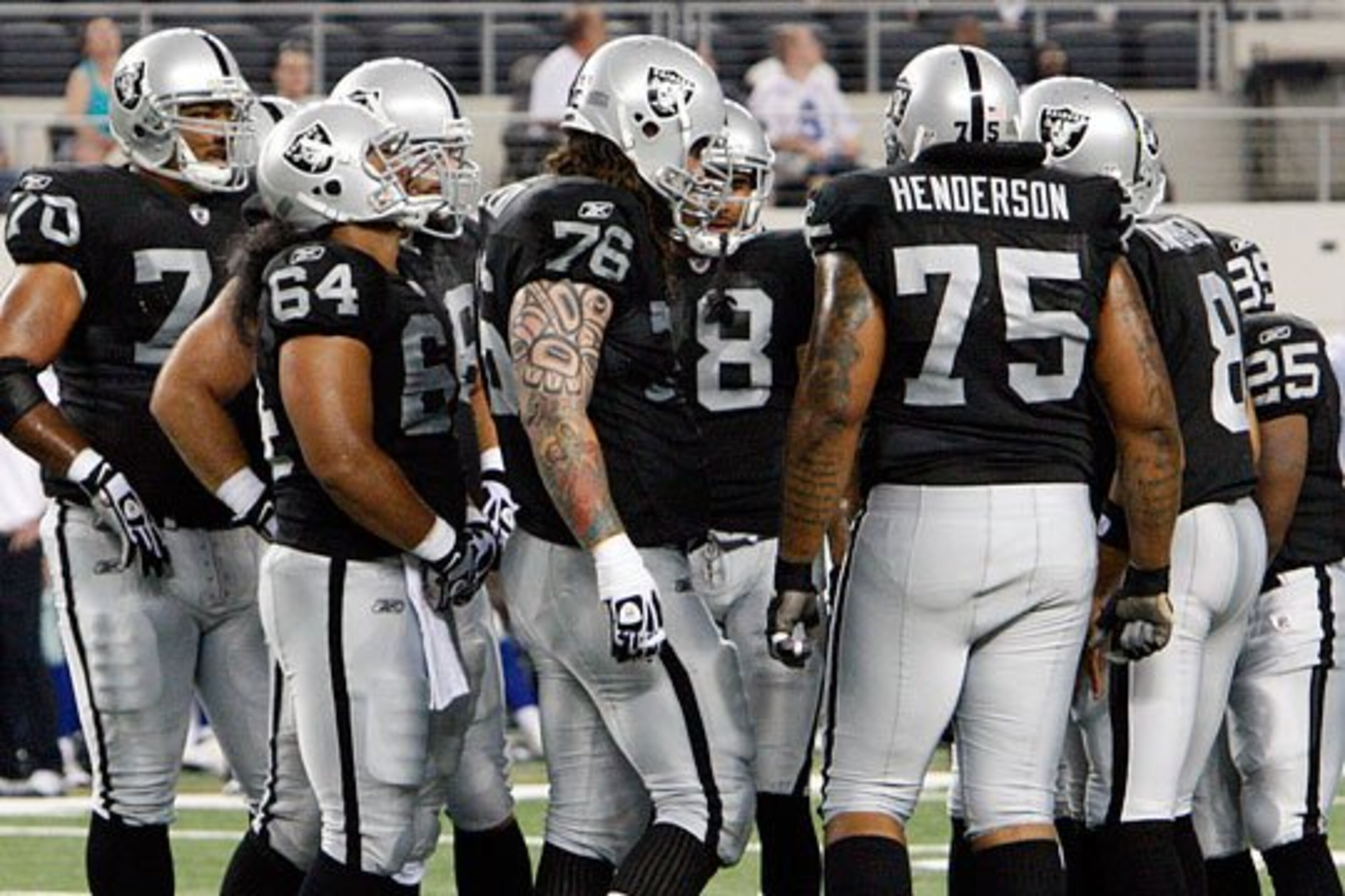 The Raiders offensive line in the huddle on Thursday night The Raiders offensive line in the huddle on Thursday night