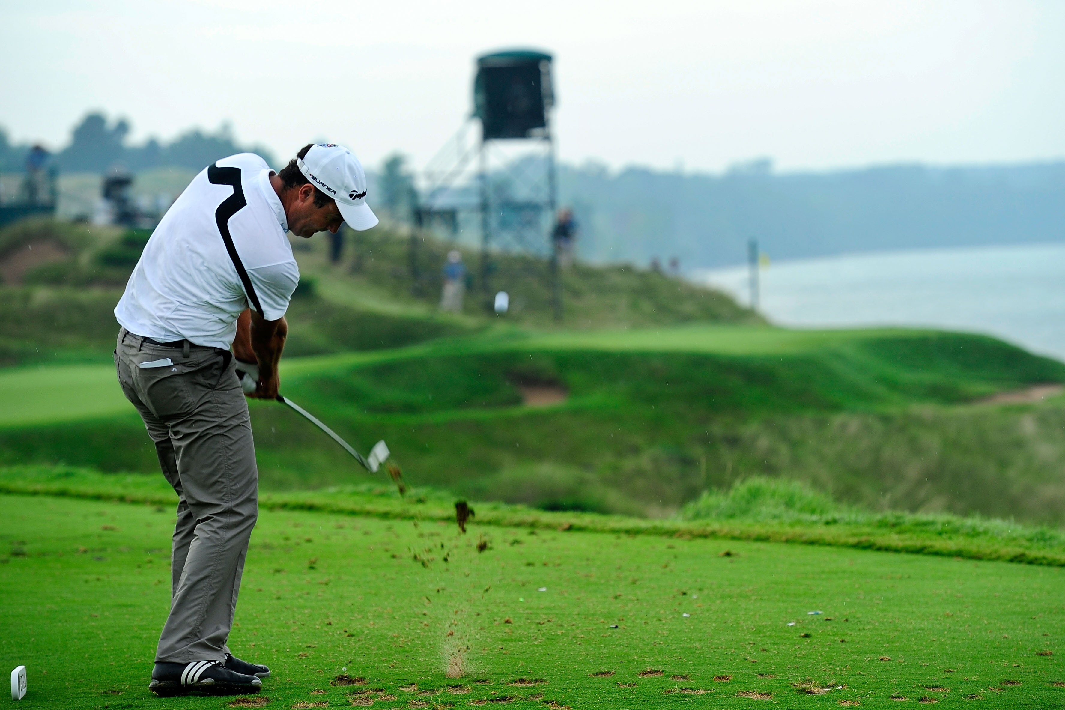 KOHLER, WI - AUGUST 13:  Simon Khan of England hits his tee shot on the 12th hole during the second round of the 92nd PGA Championship on the Straits Course at Whistling Straits on August 13, 2010 in Kohler, Wisconsin.  (Photo by Stuart Franklin/Getty Ima