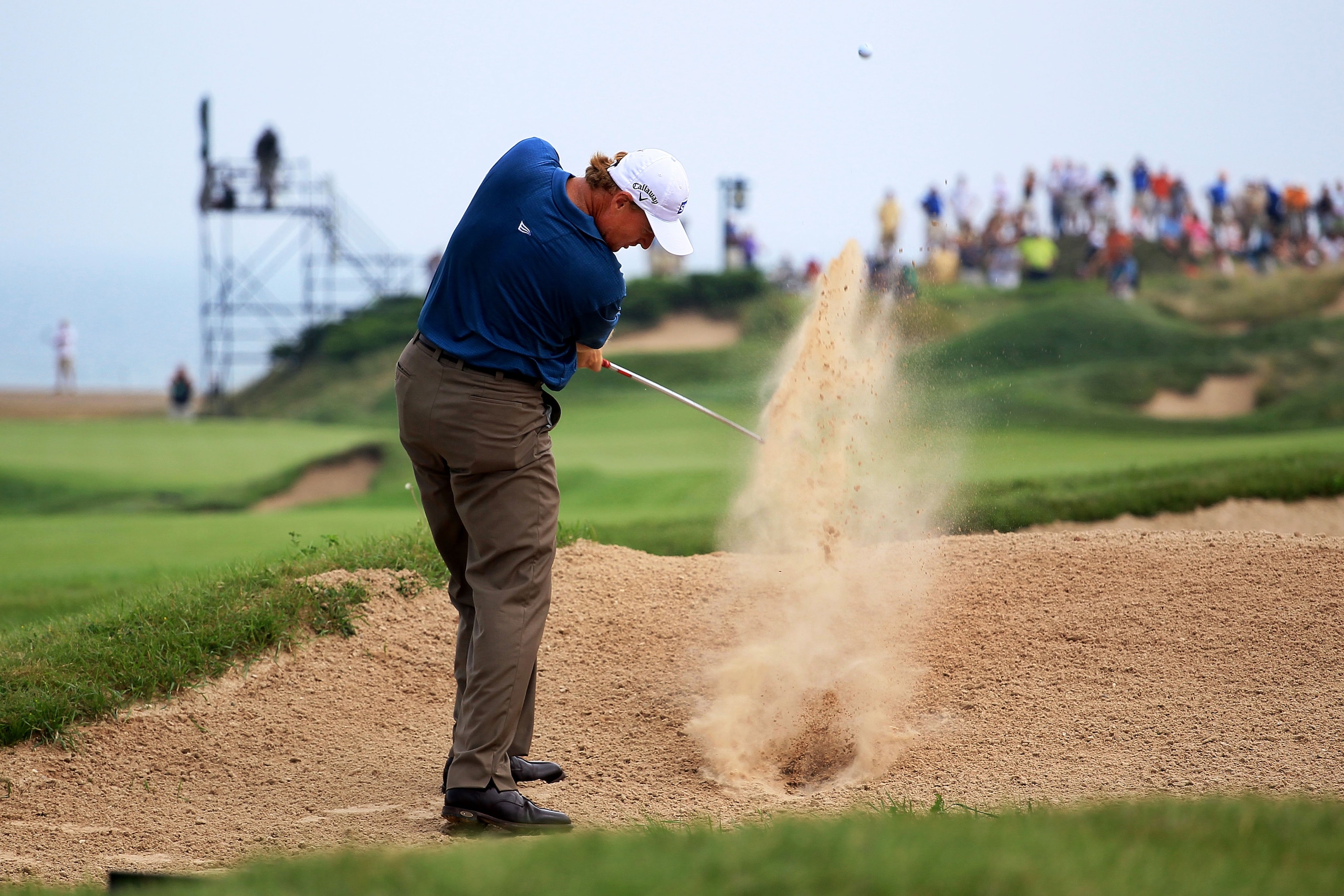 KOHLER, WI - AUGUST 13:  Ernie Els of South Africa plays a bunker shot on the first hole during the second round of the 92nd PGA Championship on the Straits Course at Whistling Straits on August 13, 2010 in Kohler, Wisconsin.  (Photo by Andy Lyons/Getty I