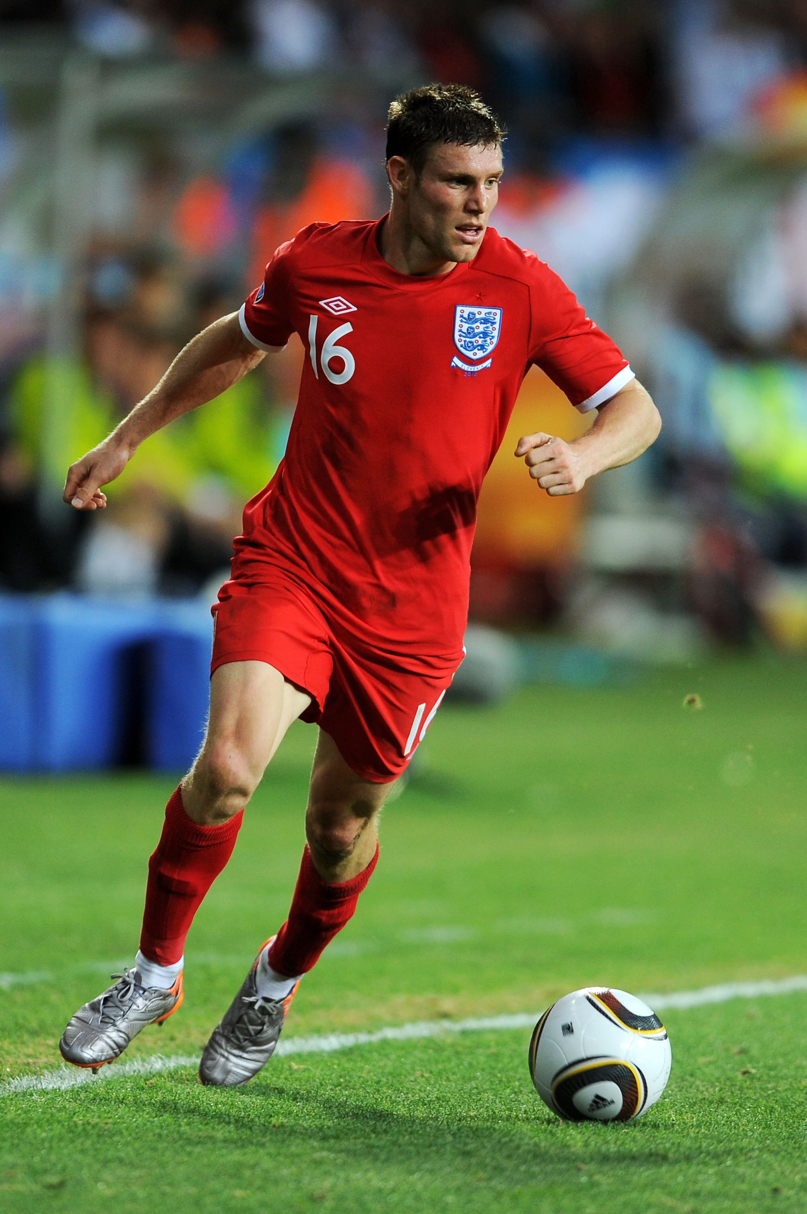 PORT ELIZABETH, SOUTH AFRICA - JUNE 23:  James Milner of England in action during the 2010 FIFA World Cup South Africa Group C match between Slovenia and England at the Nelson Mandela Bay Stadium on June 23, 2010 in Port Elizabeth, South Africa.  (Photo b