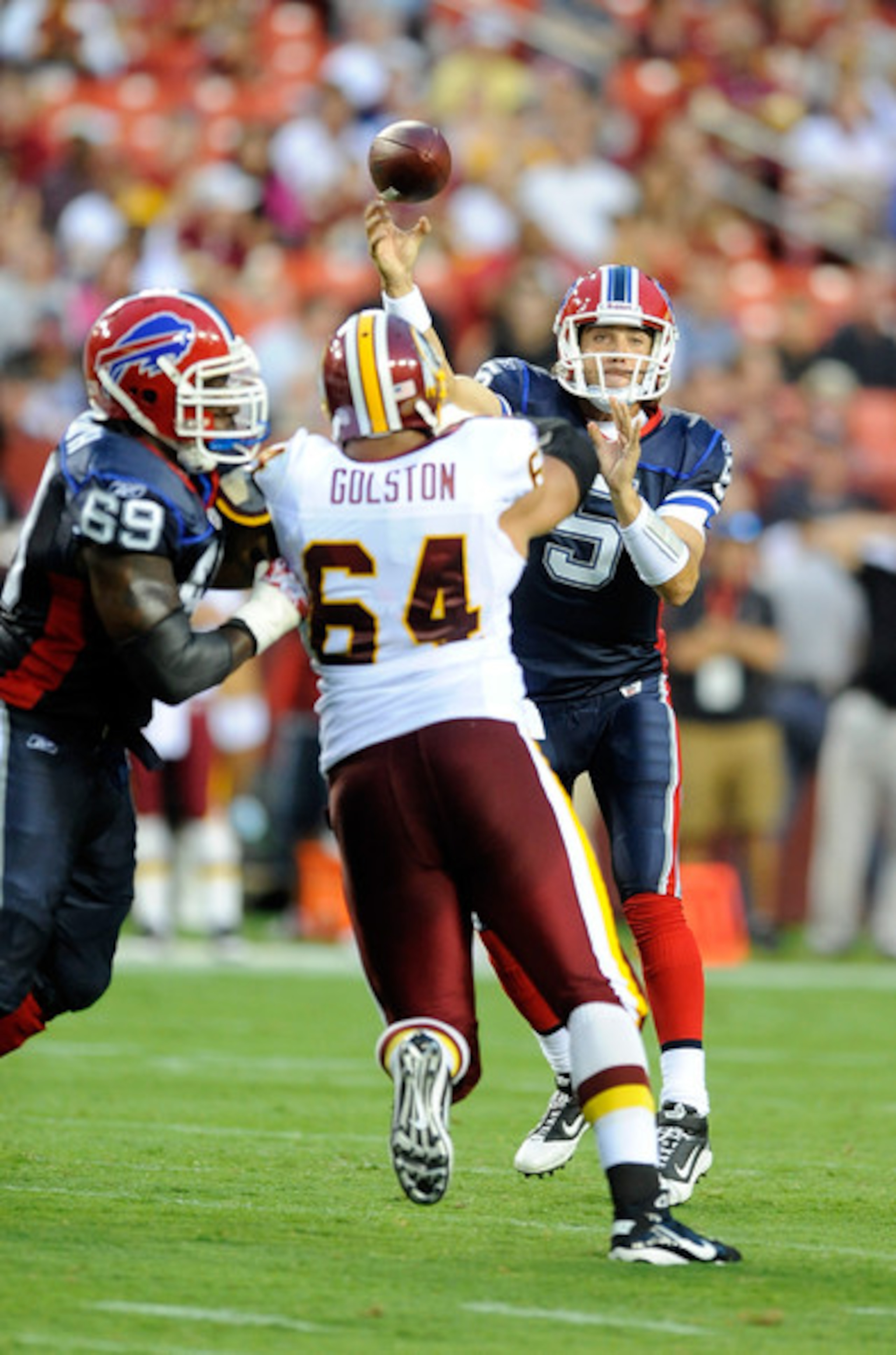Jamon Meredith tries to give Trent Edwards a chance to get his throw away