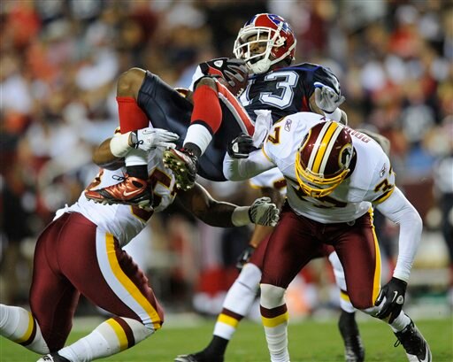 Steve Johnson gets hammered after the catch