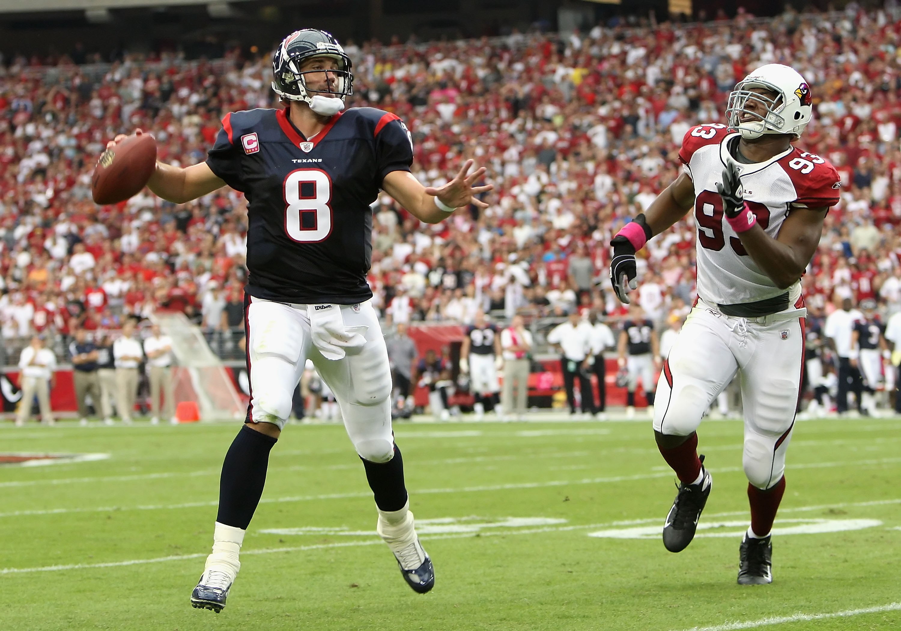 GLENDALE, AZ - OCTOBER 11:  Quarterback Matt Schaub #8 of the Houston Texans scrambles to pass under pressure from Calais Campbell #93 of the Arizona Cardinals during the NFL game at the Universtity of Phoenix Stadium on October 11, 2009 in Glendale, Ariz