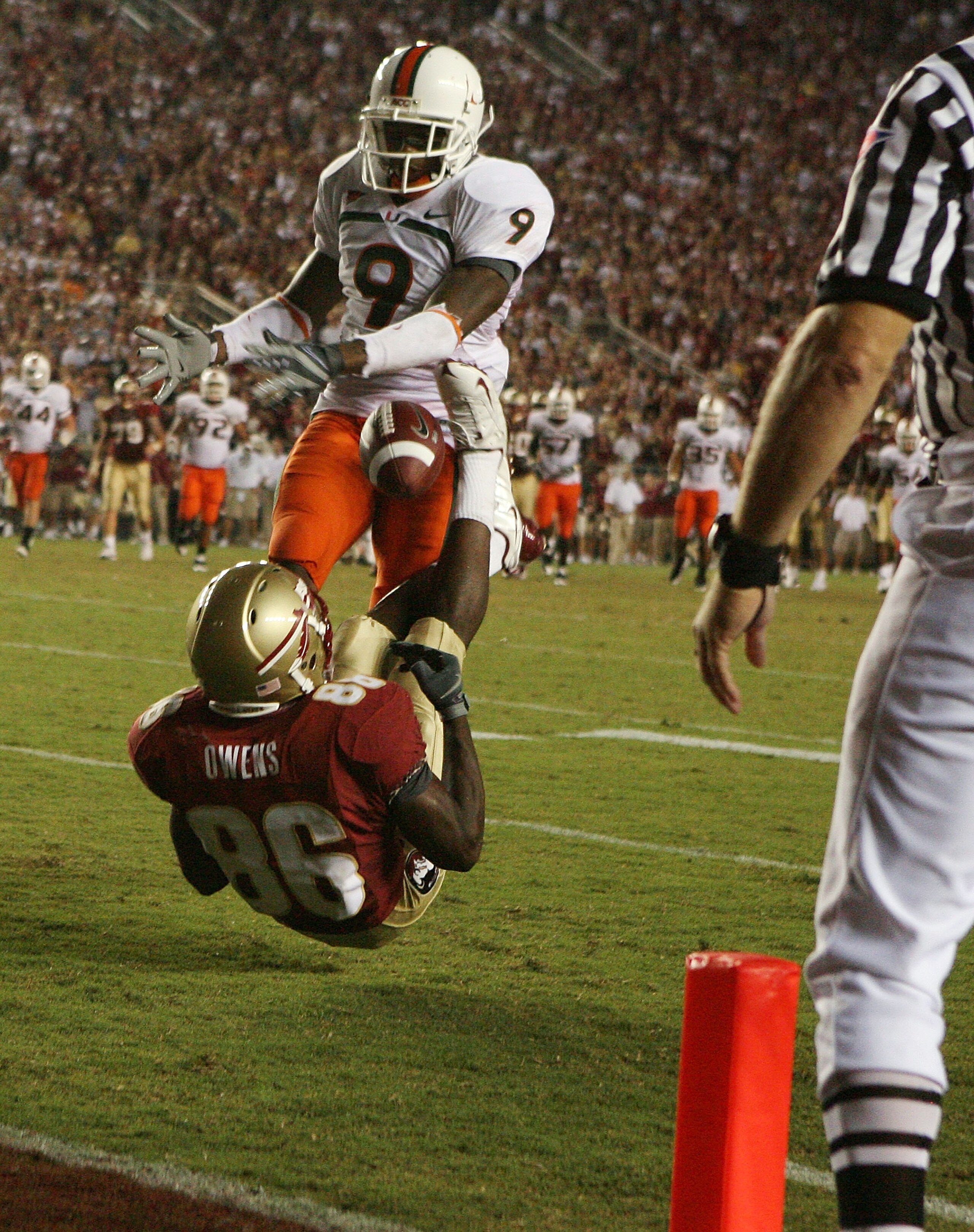 TALLAHASSEE, FL - SEPTEMBER 07: Defensive back Sam Shields #9 of the Miami Hurricanes knocks the ball away from wide receiver Rod Owens #86 of the Florida State Seminoles during a goal line stand late in the fourth quarter at Doak Campbell Stadium on Sept