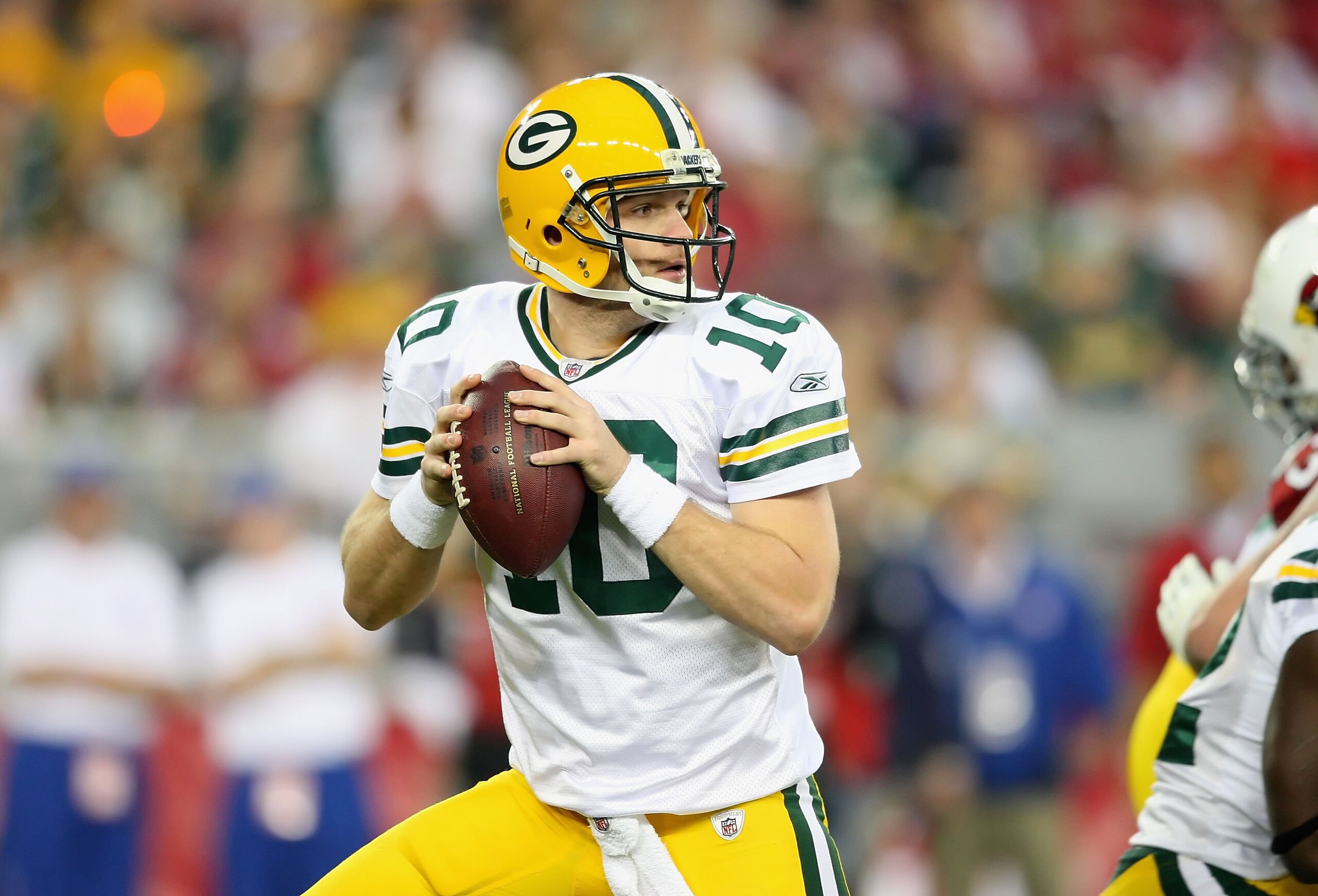 GLENDALE, AZ - JANUARY 03:  Quarterback Matt Flynn #10 of the Green Bay Packers drops back to pass during the NFL game against the Arizona Cardinals at the Universtity of Phoenix Stadium on January 3, 2010 in Glendale, Arizona.  The Packers defeated the C