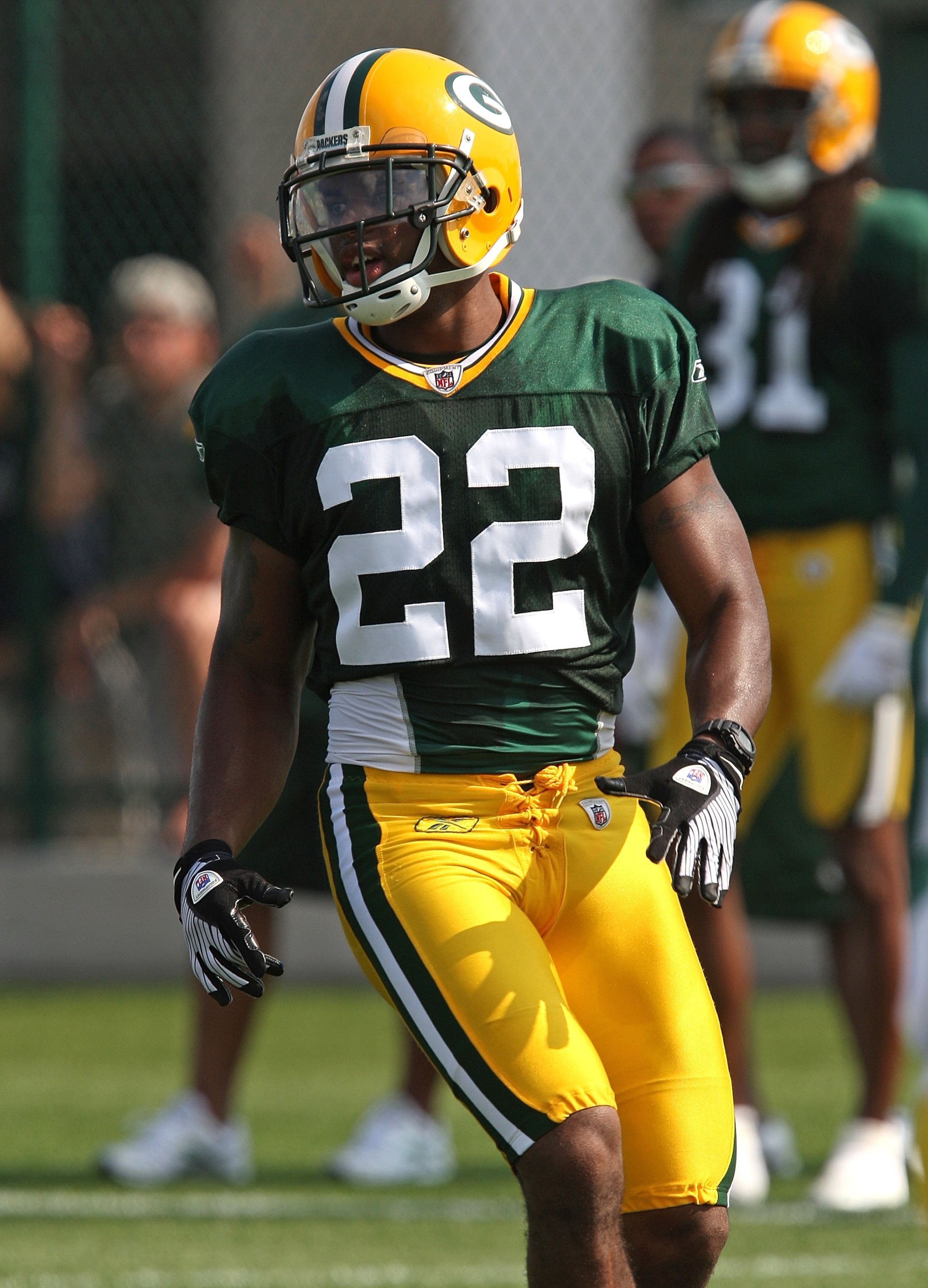 GREEN BAY, WI - AUGUST 03: Pat Lee #22 of the Green Bay Packers works out during practice at summer training camp on August 3, 2009 at the Ray Nitschke Field in Green Bay, Wisconsin. (Photo by Jonathan Daniel/Getty Images)
