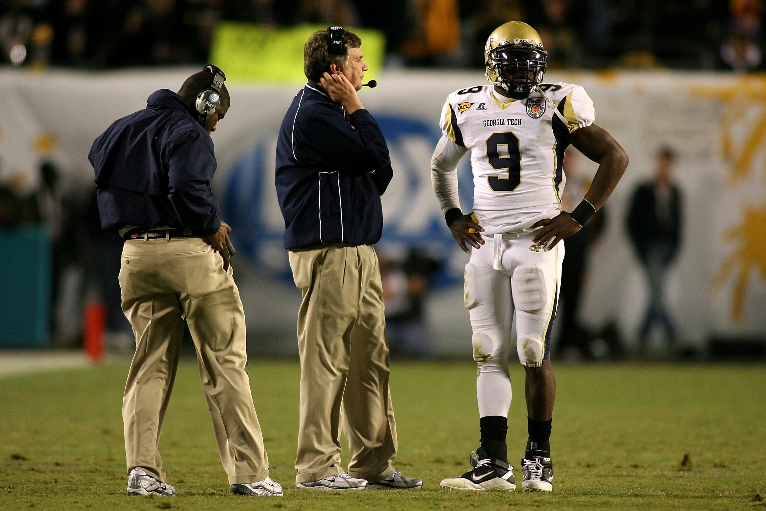 MIAMI GARDENS, FL - JANUARY 05: Head coach Paul Johnson of the Georgia Tech Yellow Jackets talks with quarterback Josh Nesbitt #9 against the Iowa Hawkeyes during the FedEx Orange Bowl at Land Shark Stadium on January 5, 2010 in Miami Gardens, Florida. MIAMI GARDENS, FL - JANUARY 05: Head coach Paul Johnson of the Georgia Tech Yellow Jackets talks with quarterback Josh Nesbitt #9 against the Iowa Hawkeyes during the FedEx Orange Bowl at Land Shark Stadium on January 5, 2010 in Miami Gardens, Florida.