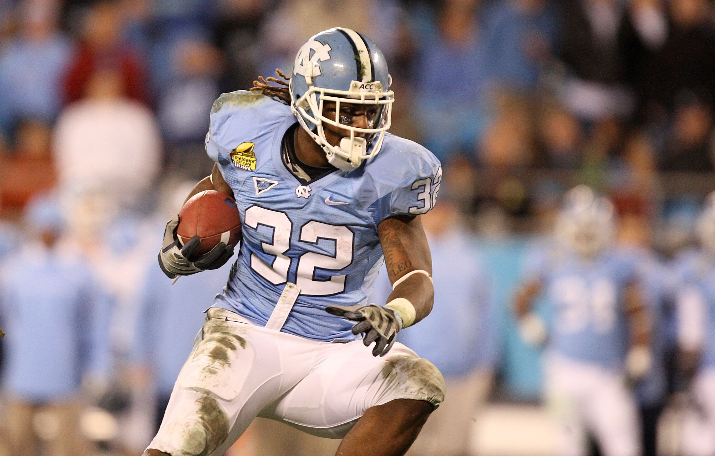 CHARLOTTE, NC - DECEMBER 26:  Ryan Houston #32 of the North Carolina Tar Heels runs with the ball against the Pittsburgh Panthers during their game on December 26, 2009 in Charlotte, North Carolina.  (Photo by Streeter Lecka/Getty Images)