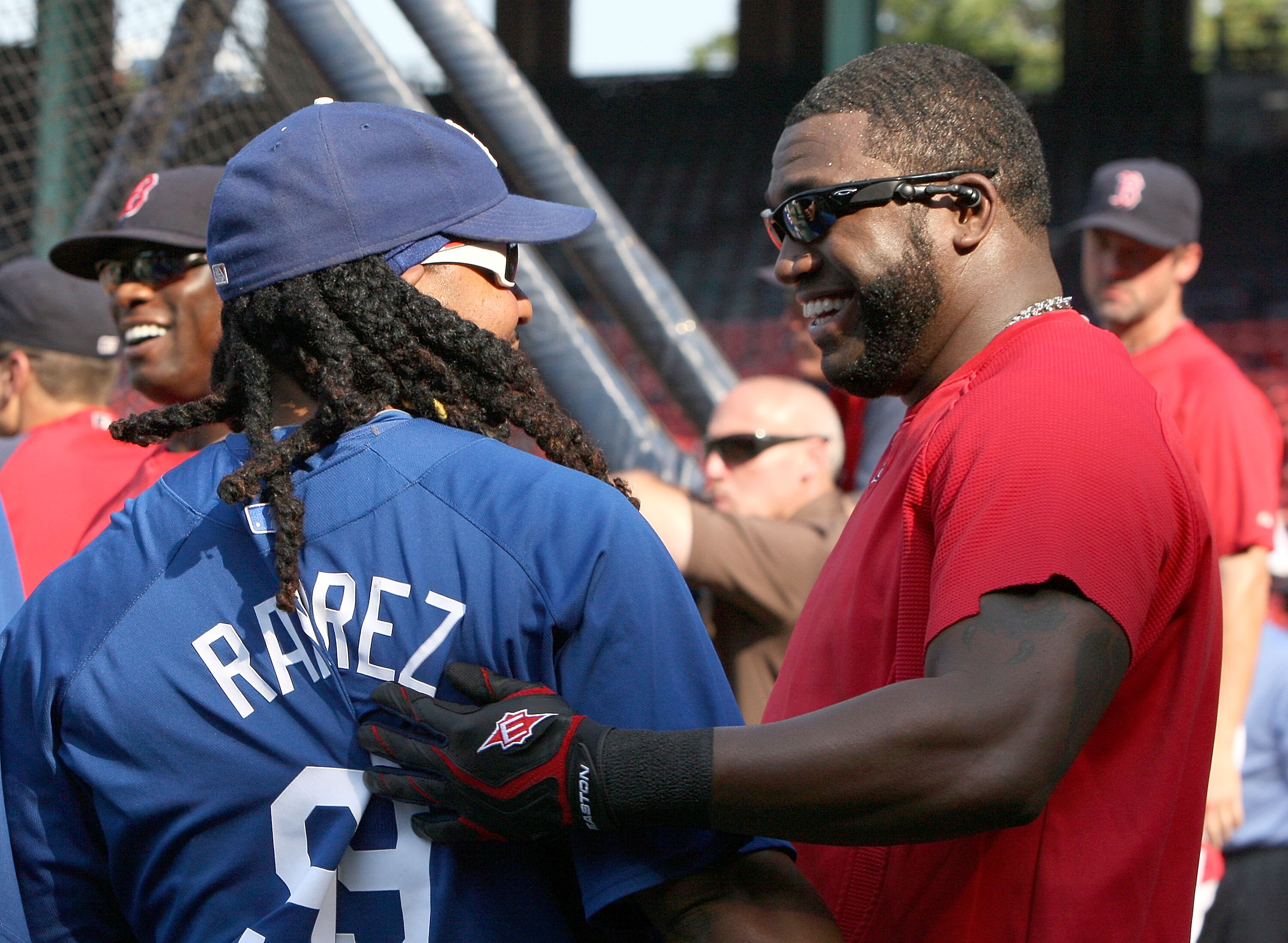 BOSTON - JUNE 18:  Manny Ramirez #99 of the Los Angeles Dodgers interacts with former teammate David Ortiz of the Boston Red Sox before a game at Fenway Park on June 18, 2010 in Boston, Massachusetts. (Photo by Jim Rogash/Getty Images)