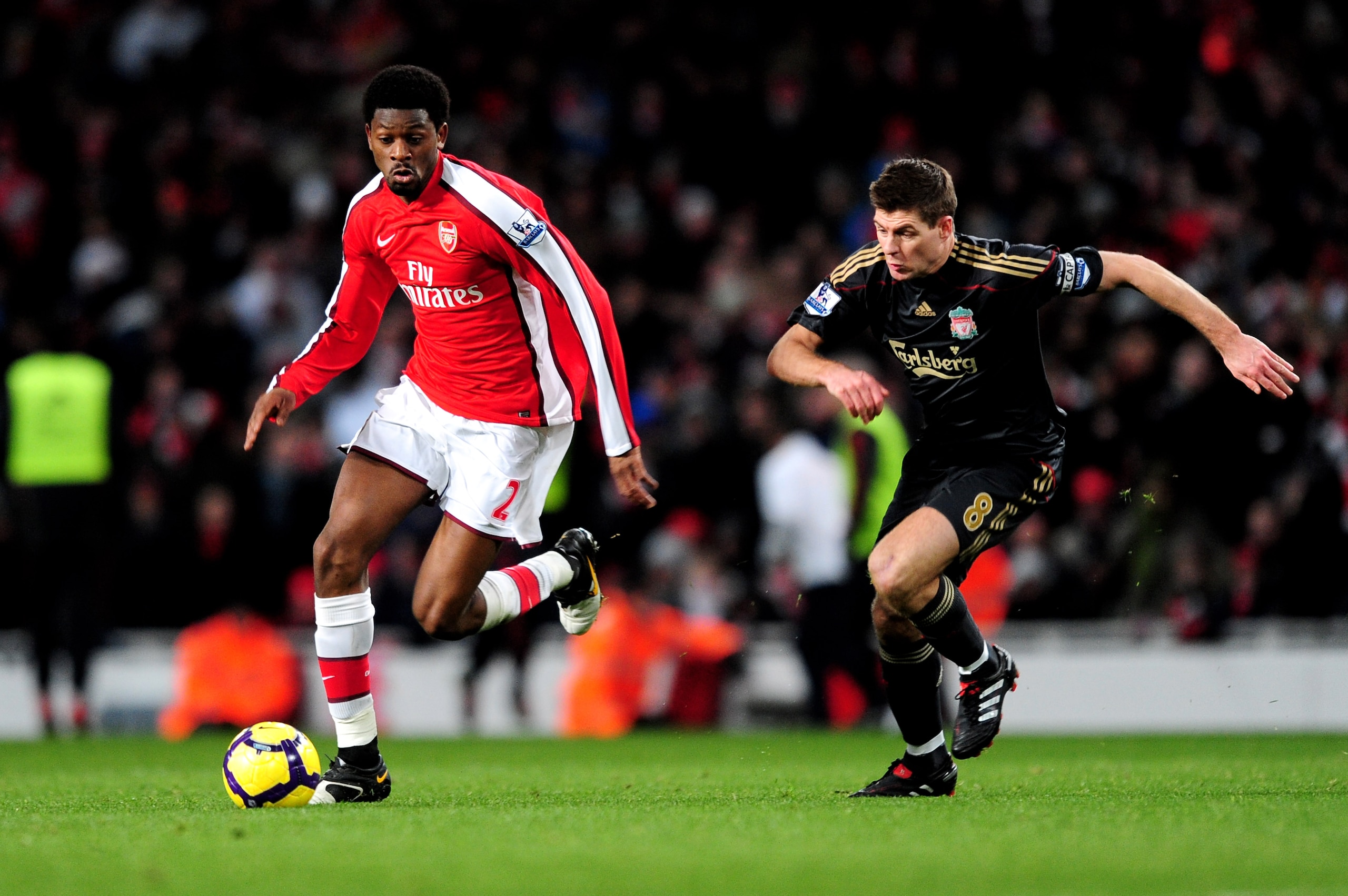 LONDON, ENGLAND - FEBRUARY 10:  Abou Diaby of Arsenal gets past Steven Gerrard of Liverpool during the Barclays Premier League match between Arsenal and Liverpool at Emirates Stadium on February 10, 2010 in London, England.  (Photo by Mike Hewitt/Getty Im