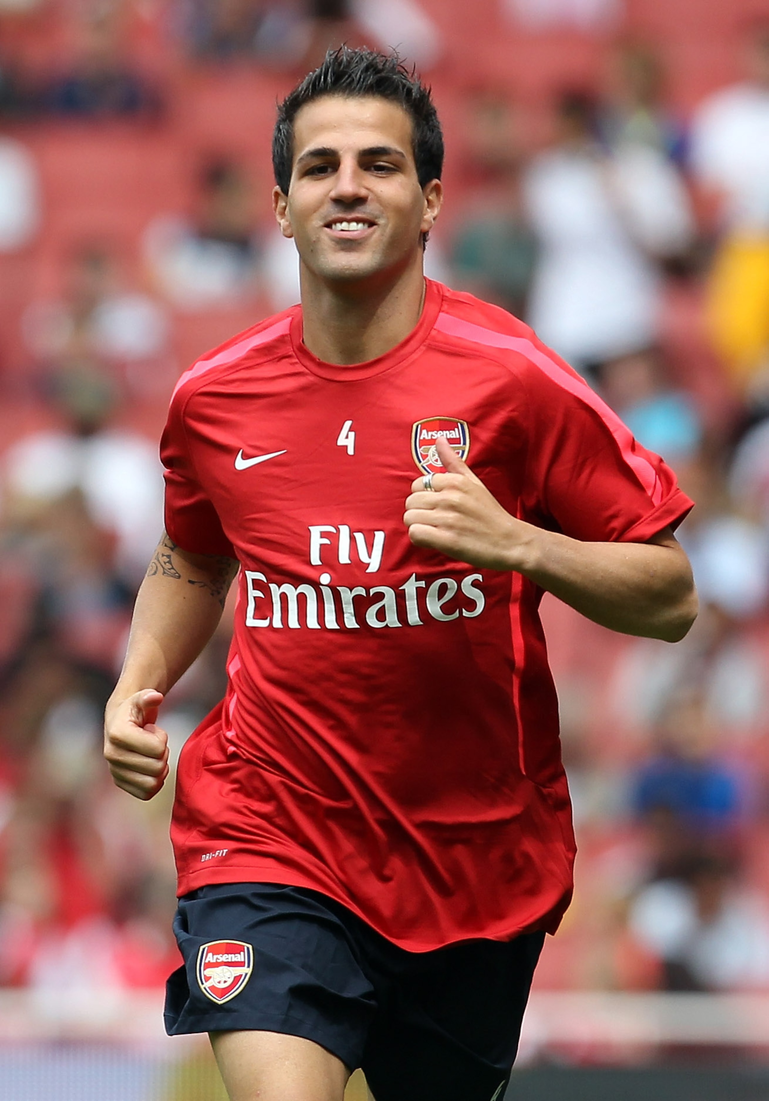 LONDON, ENGLAND - AUGUST 05:  Cesc Fabregas of Arsenal attends an Arsenal open training session at Emirates Stadium on August 5, 2010 in London, England.  (Photo by Bryn Lennon/Getty Images)