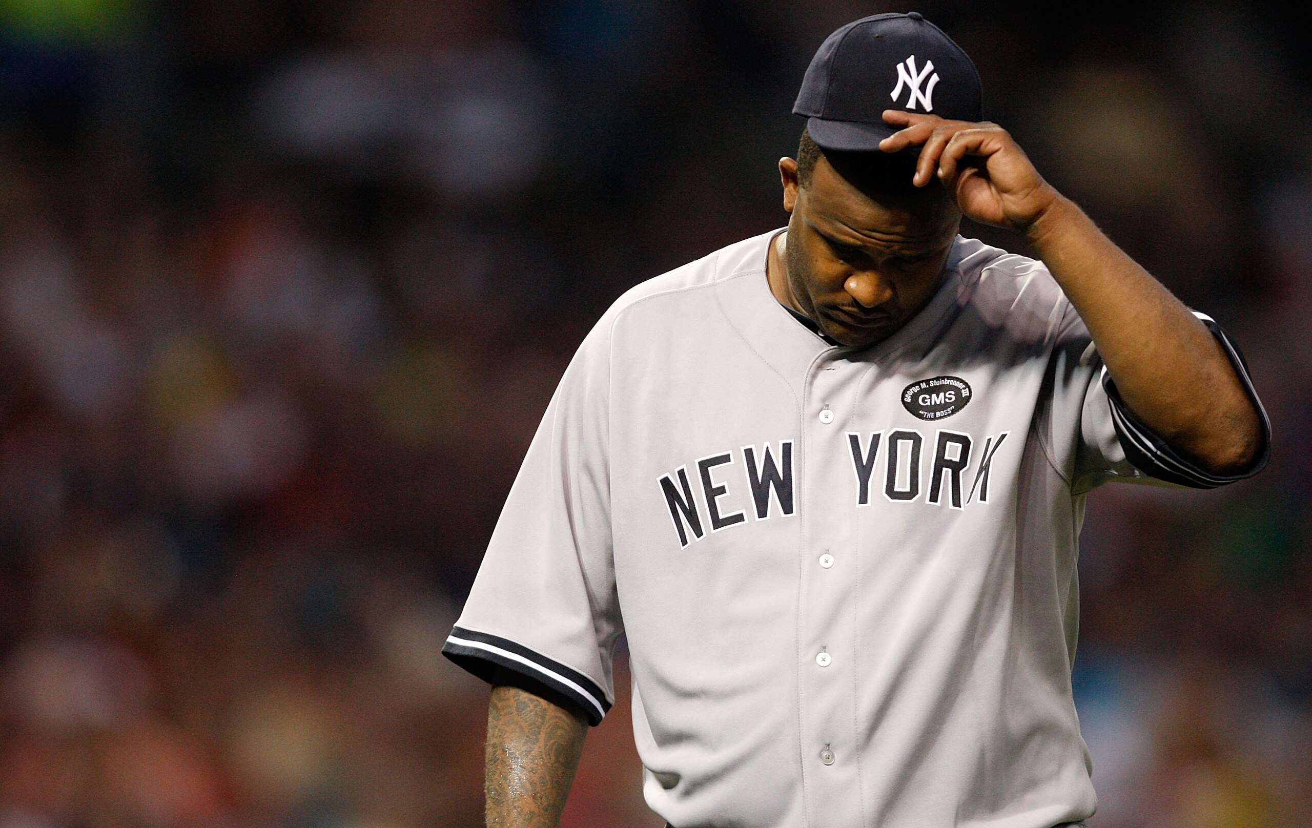CLEVELAND - JULY 27: CC Sabathia #52 of the New York Yankees walks back to the dugout at the end of an inning during the game against the Cleveland Indians on July 27, 2010 at Progressive Field in Cleveland, Ohio. (Photo by Jared Wickerham/Getty Images) CLEVELAND - JULY 27: CC Sabathia #52 of the New York Yankees walks back to the dugout at the end of an inning during the game against the Cleveland Indians on July 27, 2010 at Progressive Field in Cleveland, Ohio. (Photo by Jared Wickerham/Getty Images)