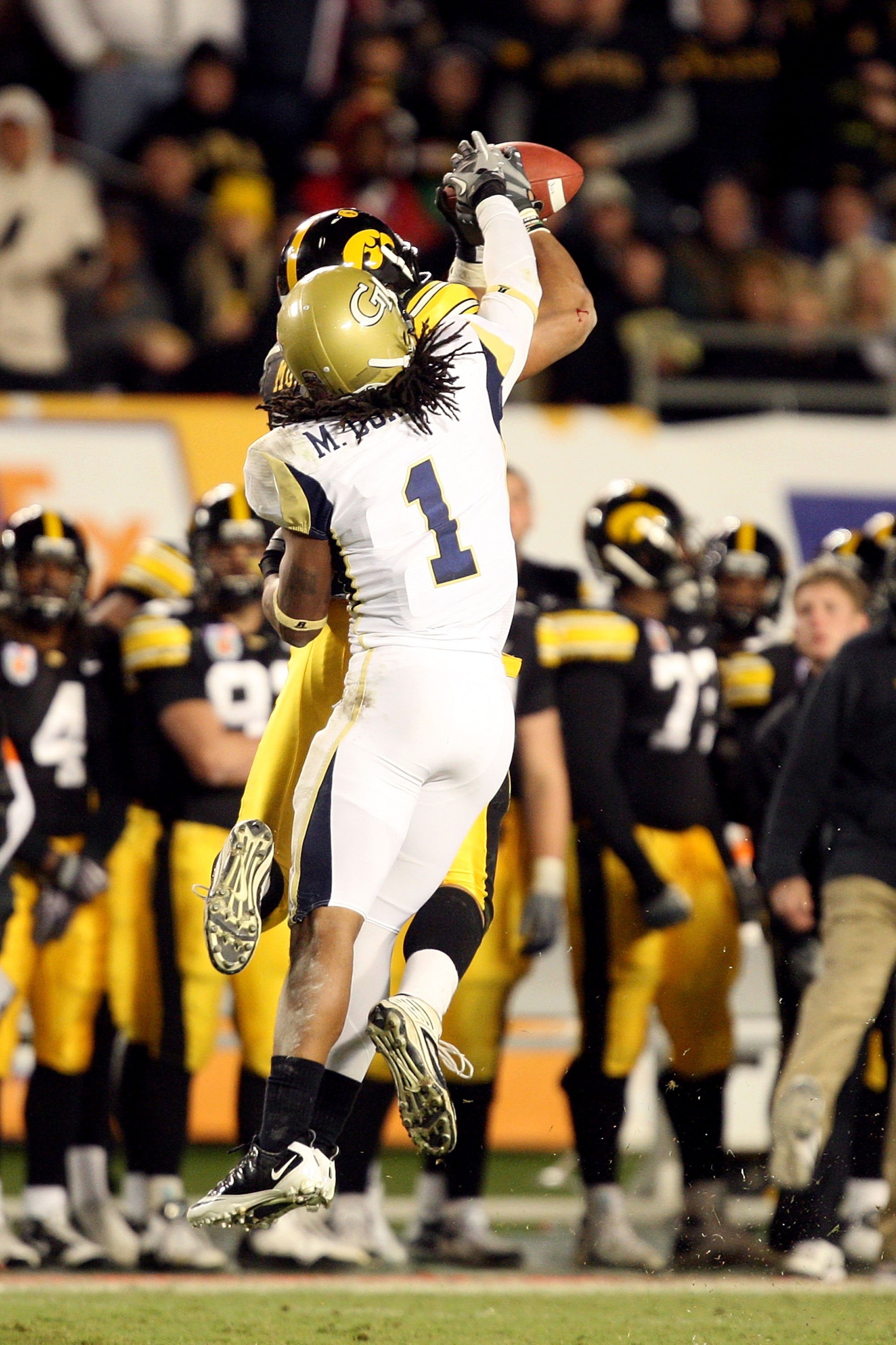 MIAMI GARDENS, FL - JANUARY 05:  Morgan Burnett #1 of the Georgia Tech Yellow Jackets defends against the Iowa Hawkeyes during the FedEx Orange Bowl at Land Shark Stadium on January 5, 2010 in Miami Gardens, Florida.  (Photo by Streeter Lecka/Getty Images