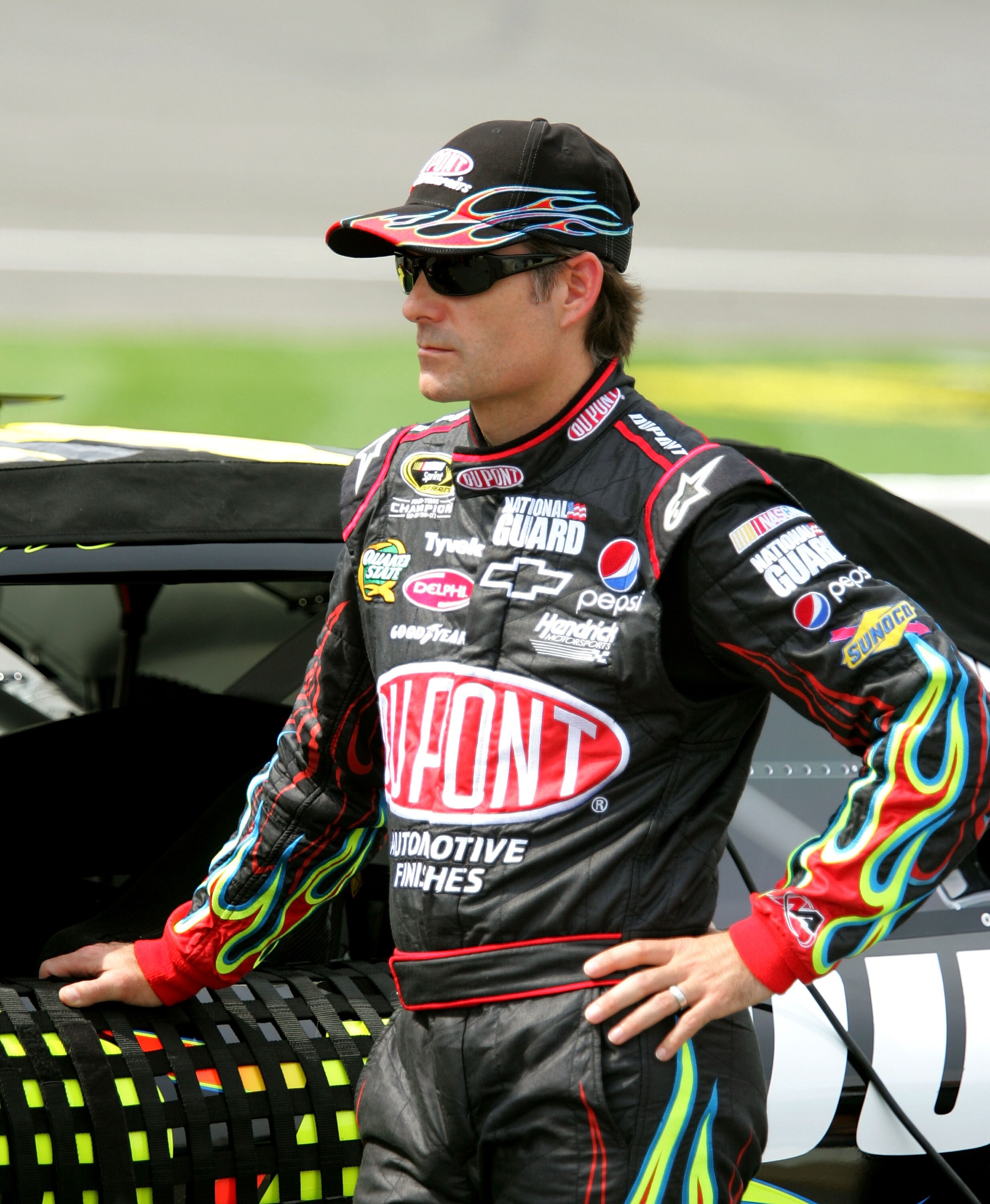 BROOKLYN, MI - AUGUST 13:  Jeff Gordon, driver of the #24 DuPont Chevrolet stands on pit road during qualifying for the NASCAR Sprint Cup Series CARFAX 400 at Michigan International Speedway on August 13, 2010 in Brooklyn, Michigan.  (Photo by Jerry Markl