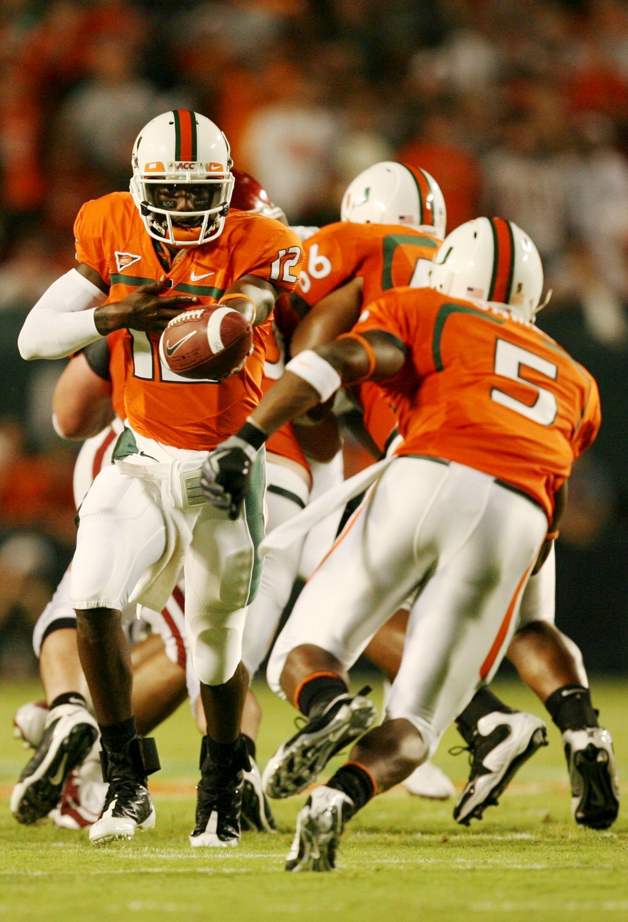 MIAMI GARDENS, FL - OCTOBER 3:  Quarterback Jacory Harris #12 of the Miami Hurricanes looks to pass the ball against the Oklahoma Sooners in the second quarter of the game on October 3, 2009 at Landshark Stadium in Miami Gardens, Florida. (Photo by Doug B