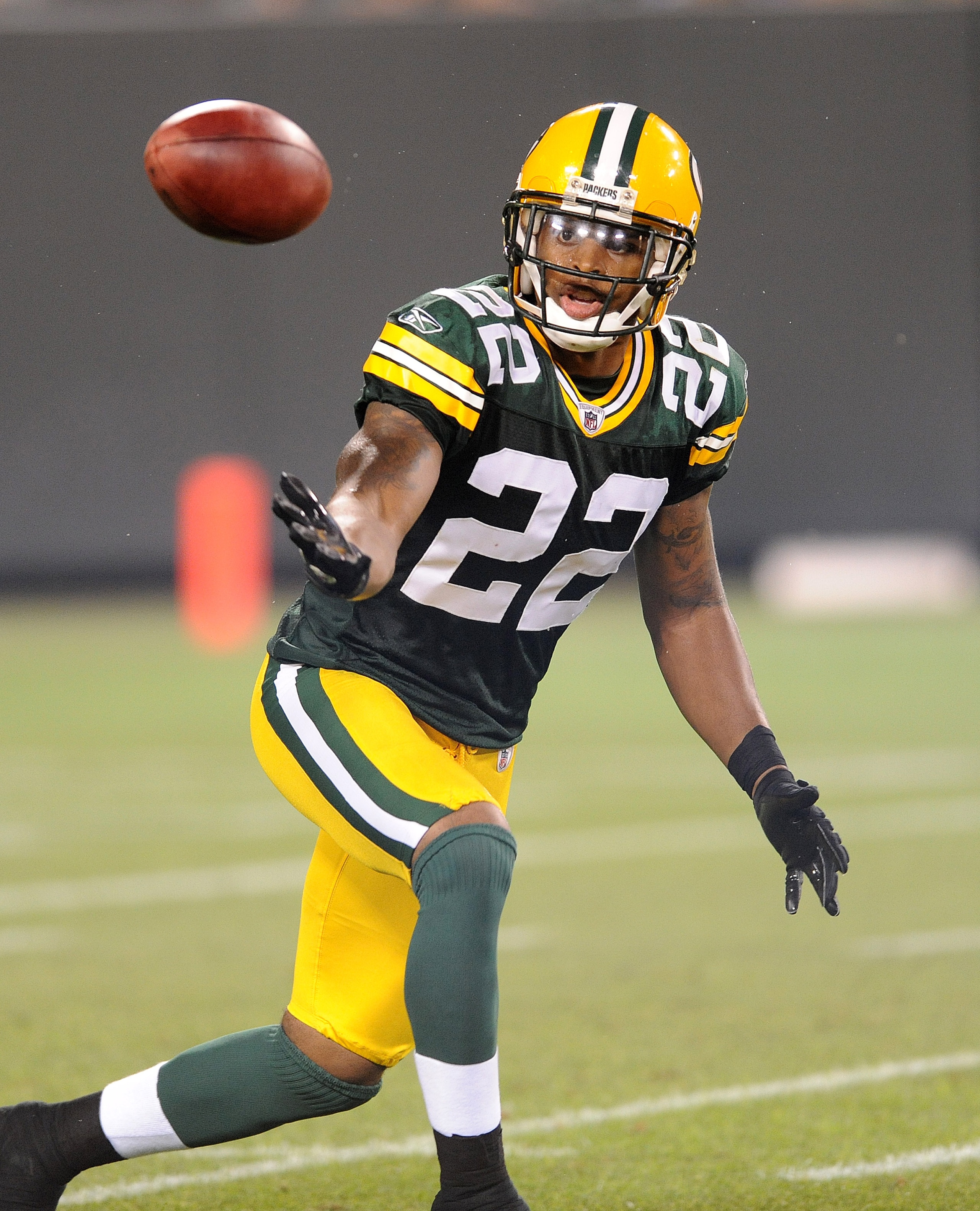 GREEN BAY, WI - AUGUST 14: Pat Lee #22 of the Green Bay Packers bobbles a kickoff during the NFL preseason game against the Cleveland Browns at Lambeau Field August 14, 2010 in Green Bay, Wisconsin. (Photo by Tom Dahlin/Getty Images)