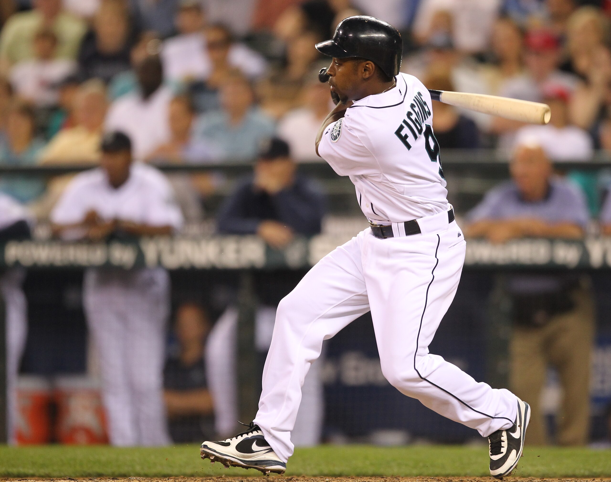 SEATTLE - AUGUST 05:  Chone Figgins #9 of the Seattle Mariners singles against the Texas Rangers at Safeco Field on August 5, 2010 in Seattle, Washington. (Photo by Otto Greule Jr/Getty Images)