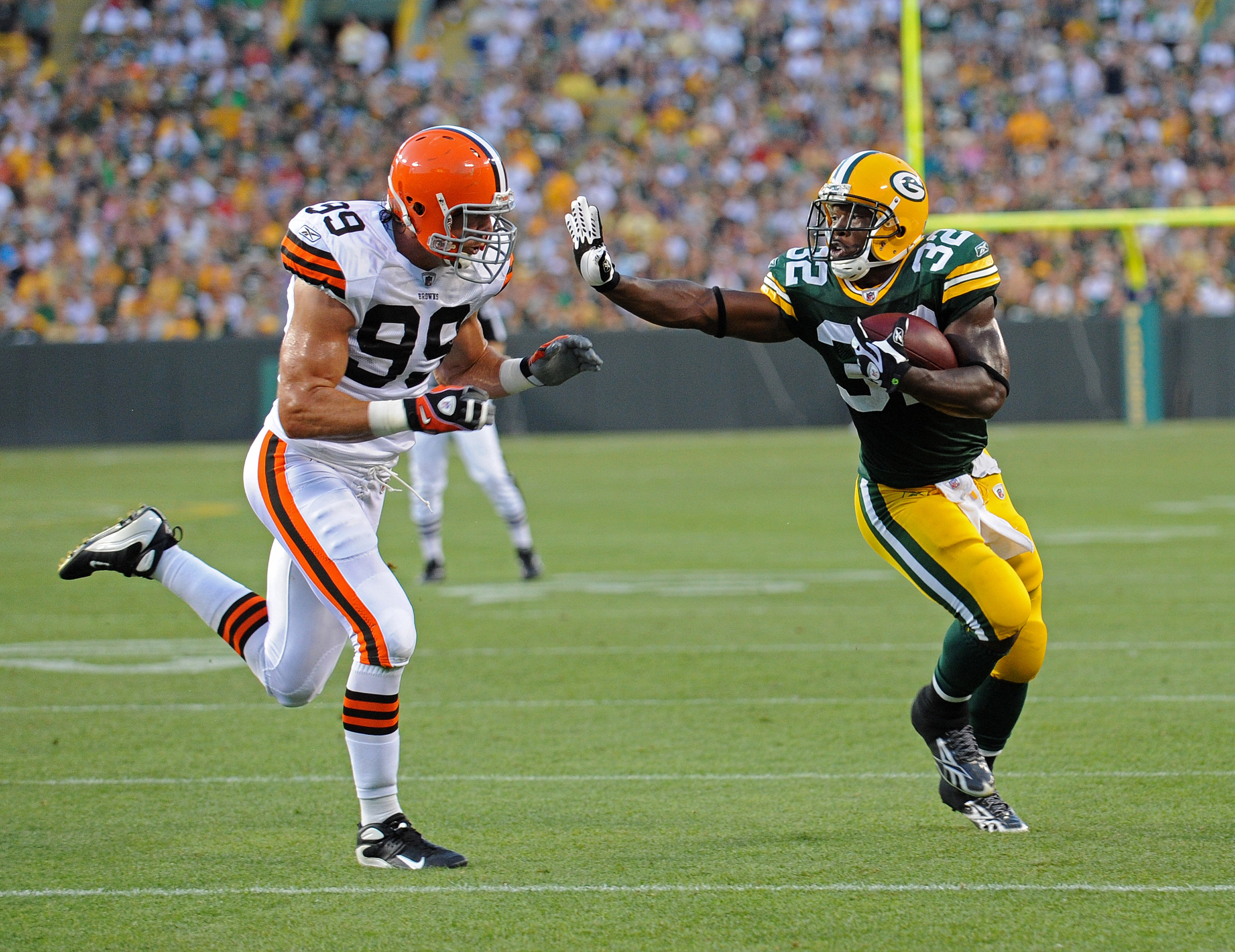 GREEN BAY - AUGUST 14: Brendon Jackson #32 of the Green Bay Packers carries the ball for a first down during the NFL preseason game against the Cleveland Browns at Lambeau Field August 14, 2010 in Green Bay, Wisconsin.  (Photo by Tom Dahlin/Getty Images)