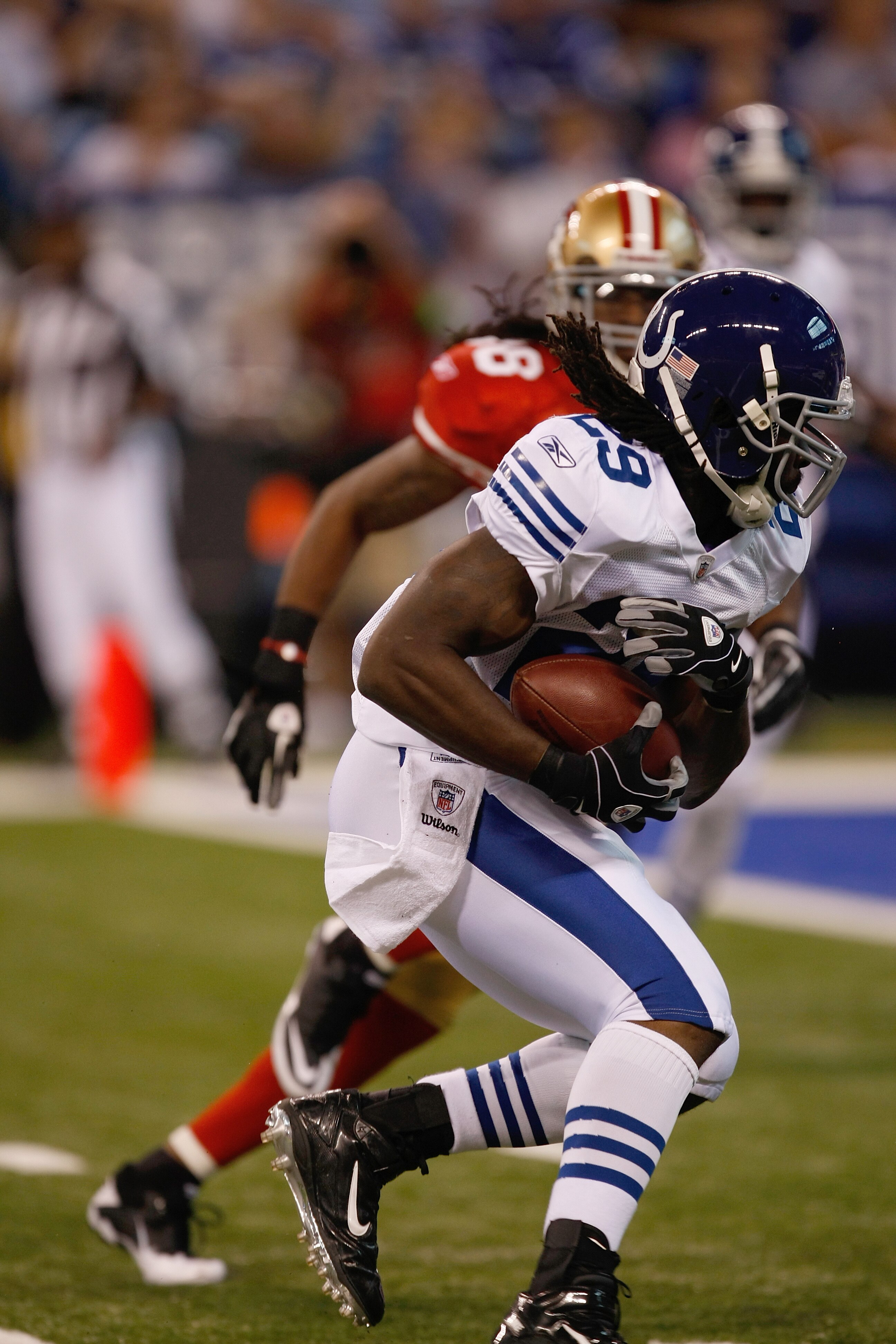 INDIANAPOLIS, IN - AUGUST 15: Joseph Addai #29 of the Indianapolis Colts runs with the ball during the preseason game against the San Francisco 49ers at Lucas Oil Stadium on August 15, 2010 in Indianapolis, Indiana.  (Photo by Scott Boehm/Getty Images)
