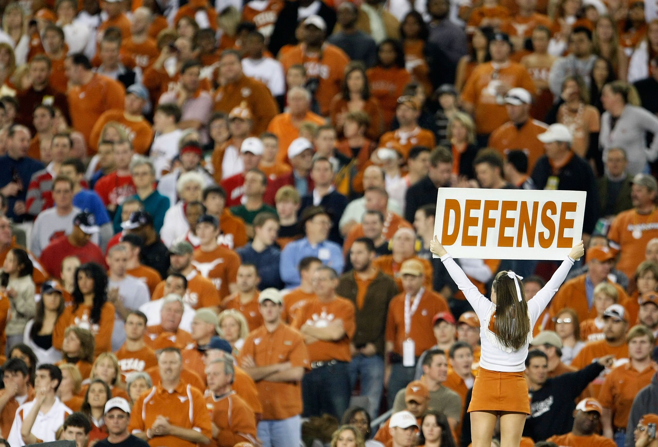 GLENDALE, AZ - JANUARY 05:  A Texas Longhorns cheerleader performs during the Tostitos Fiesta Bowl Game against the Ohio State Buckeyes on January 5, 2009 at University of Phoenix Stadium in Glendale, Arizona. The Longhorns defeated the Buckeyes 24-21  (P