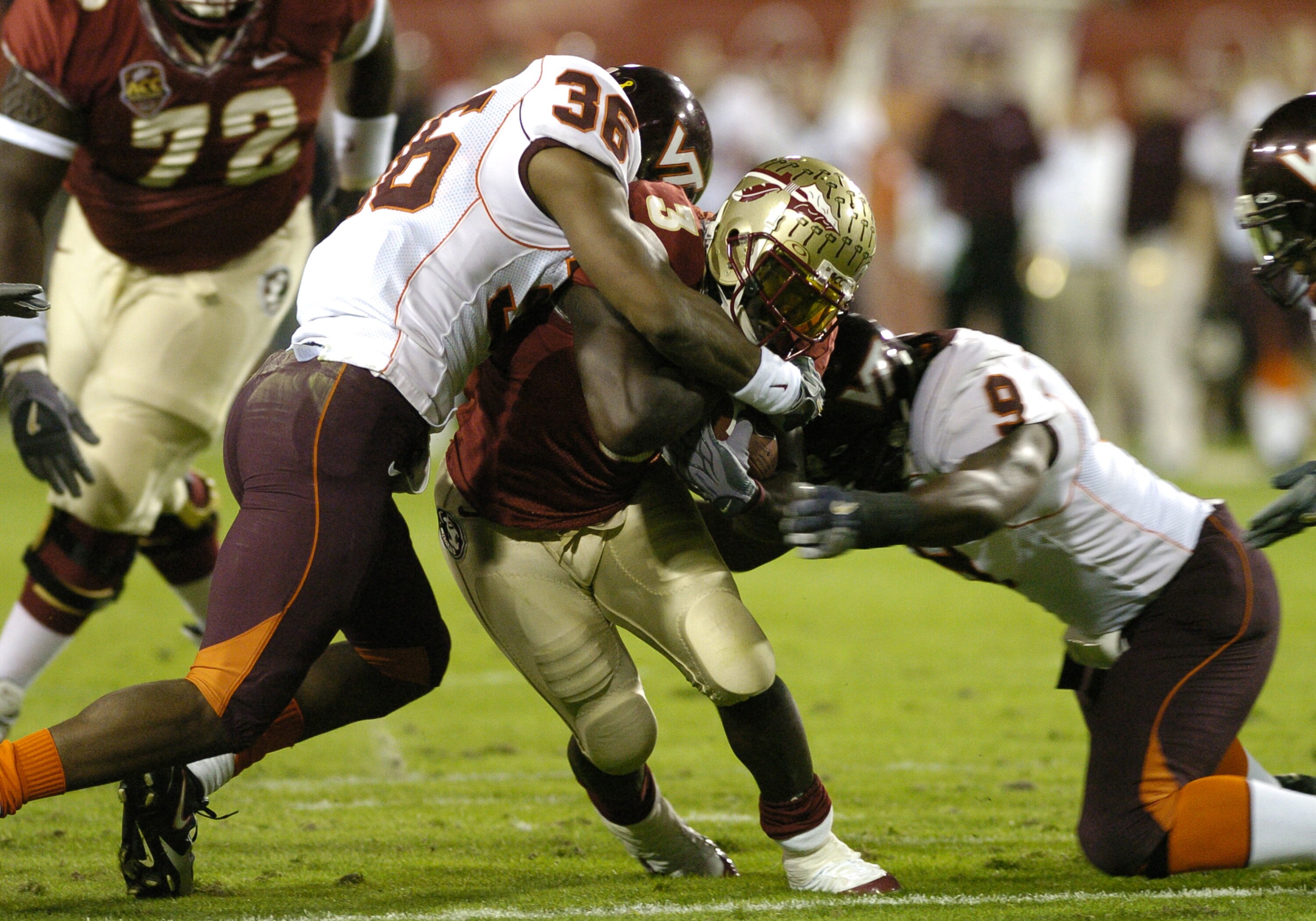 Florida State running back Leon Washington battles for a gain against  Virginia Tech at the 2005 ACC Football Championship Game in Jacksonville, Flordia on December 3, 2005.  FSU upset the Hokies to win an invitation to the BCC Orange Bowl game. (Photo by