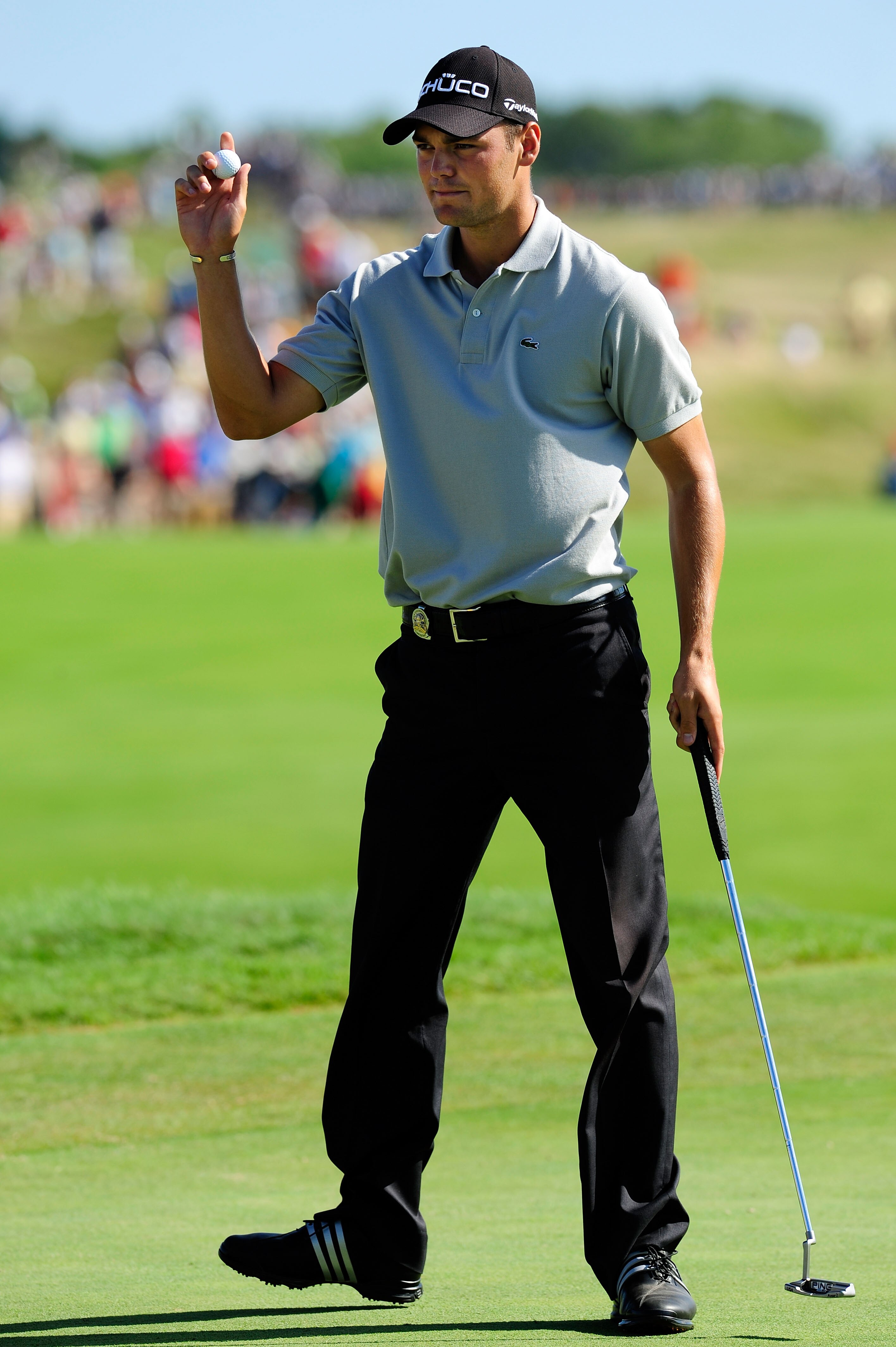 KOHLER, WI - AUGUST 15:  Martin Kaymer of Germany waves to fans after putting on the 11th hole during the final round of the 92nd PGA Championship on the Straits Course at Whistling Straits on August 15, 2010 in Kohler, Wisconsin.  (Photo by Stuart Frankl