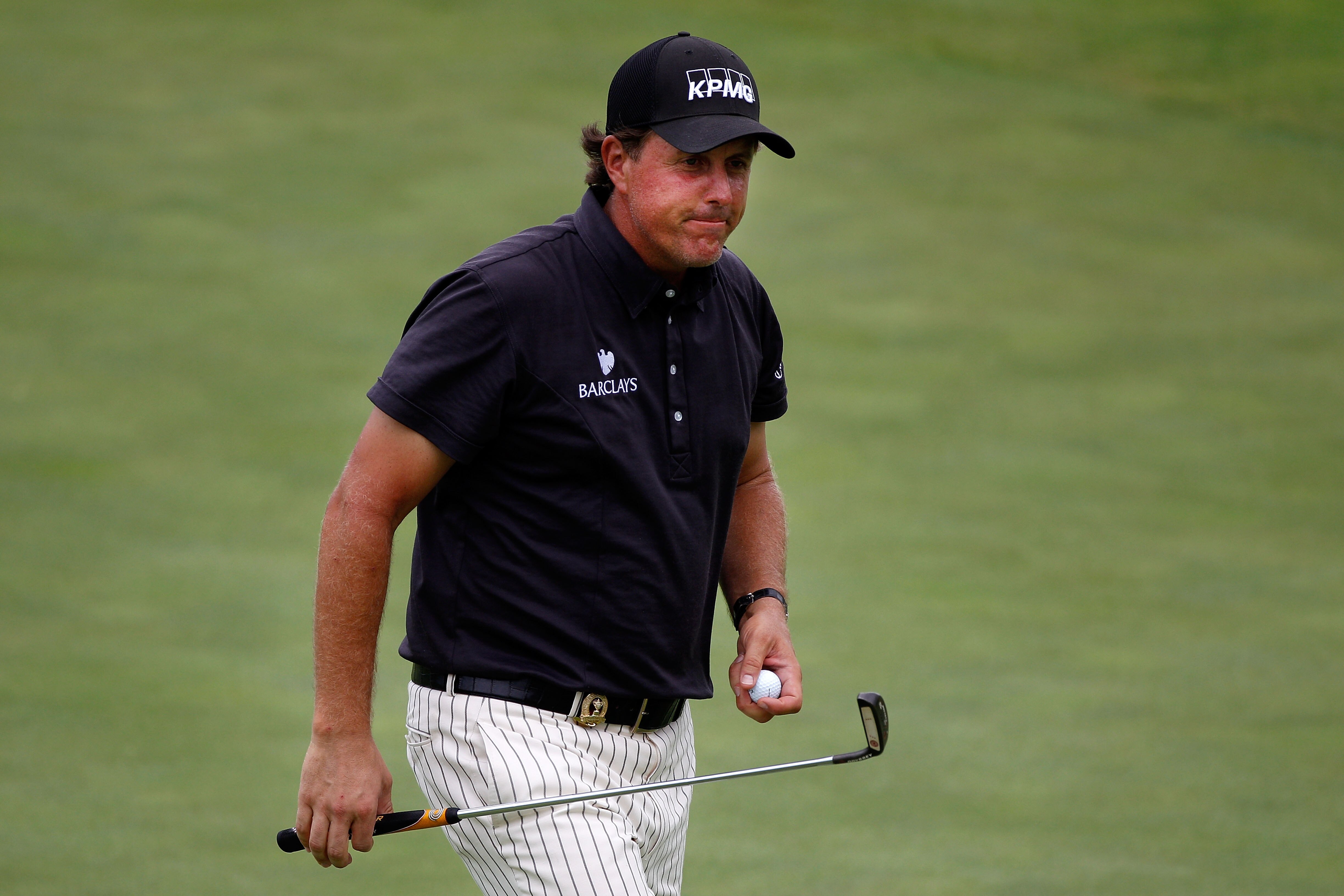 KOHLER, WI - AUGUST 14:  Phil Mickelson walks off the 18th green during the third round of the 92nd PGA Championship on the Straits Course at Whistling Straits on August 14, 2010 in Kohler, Wisconsin.  (Photo by Chris Graythen/Getty Images)