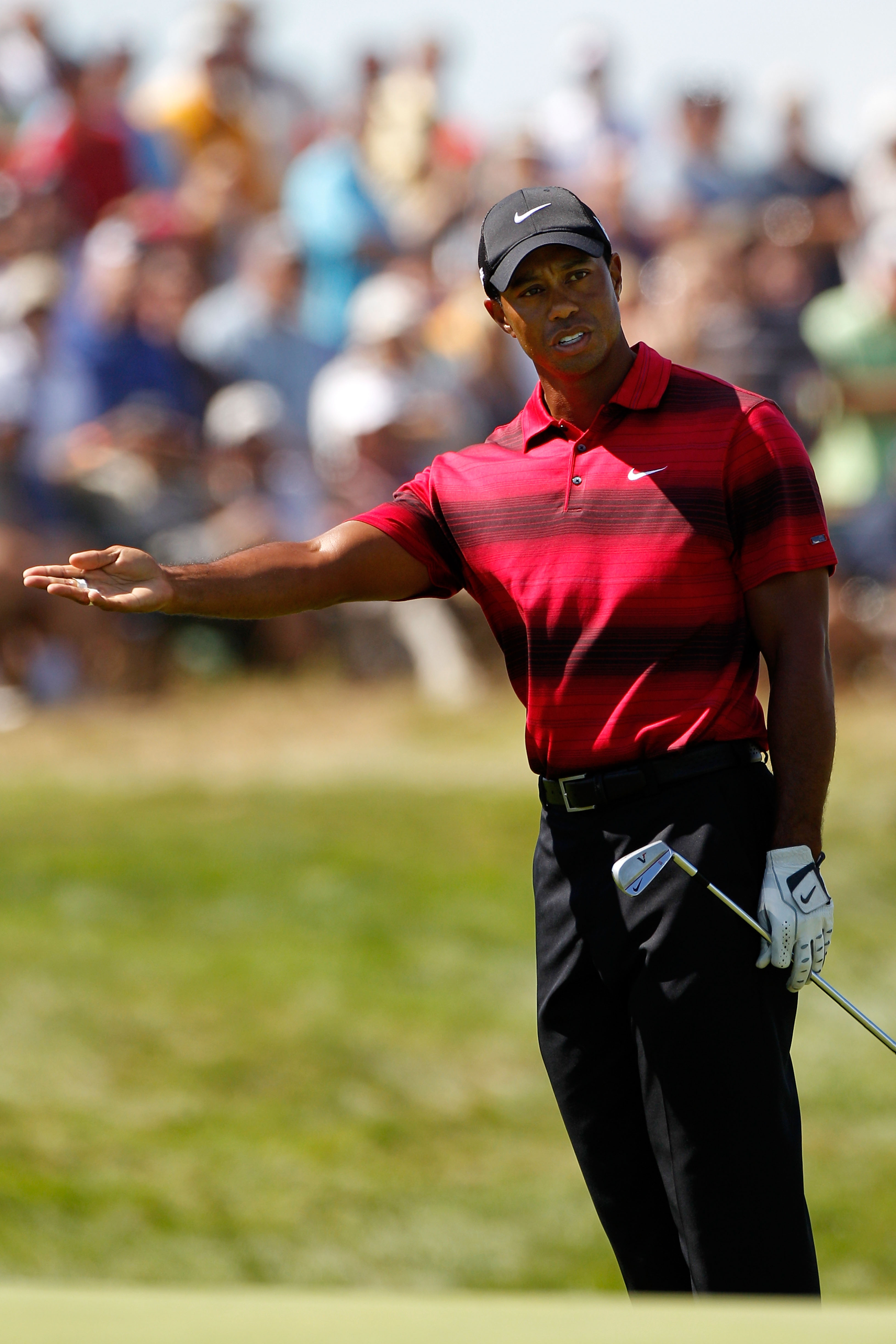 KOHLER, WI - AUGUST 15:  Tiger Woods reacts to his shot on the 16th hole during the final round of the 92nd PGA Championship on the Straits Course at Whistling Straits on August 15, 2010 in Kohler, Wisconsin.  (Photo by Sam Greenwood/Getty Images)
