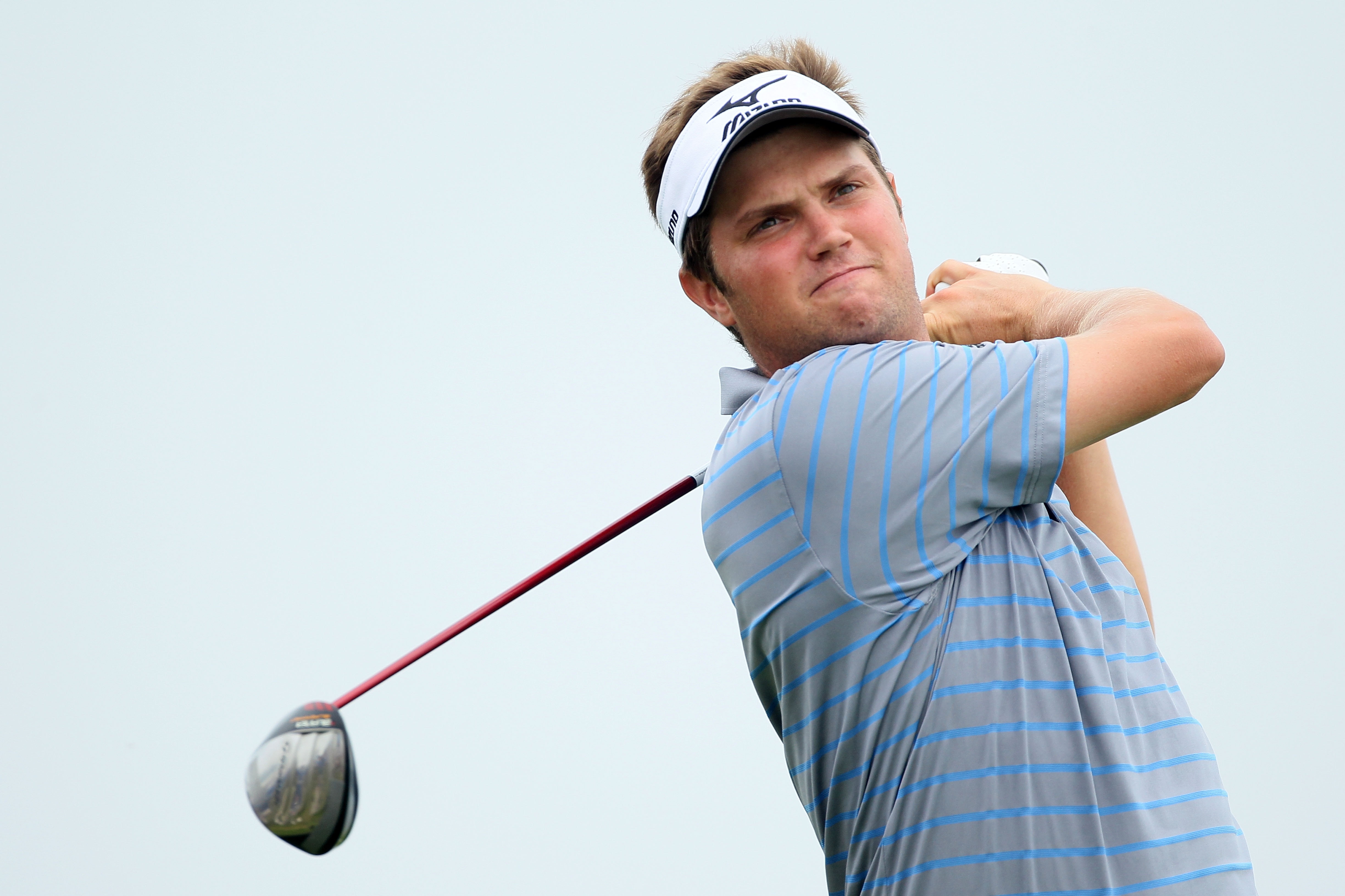 KOHLER, WI - AUGUST 13:  Jeff Overton  watches his tee shot on the 16th hole during the continuation of the first round of the 92nd PGA Championship on the Straits Course at Whistling Straits on August 13, 2010 in Kohler, Wisconsin.  (Photo by Andy Lyons/