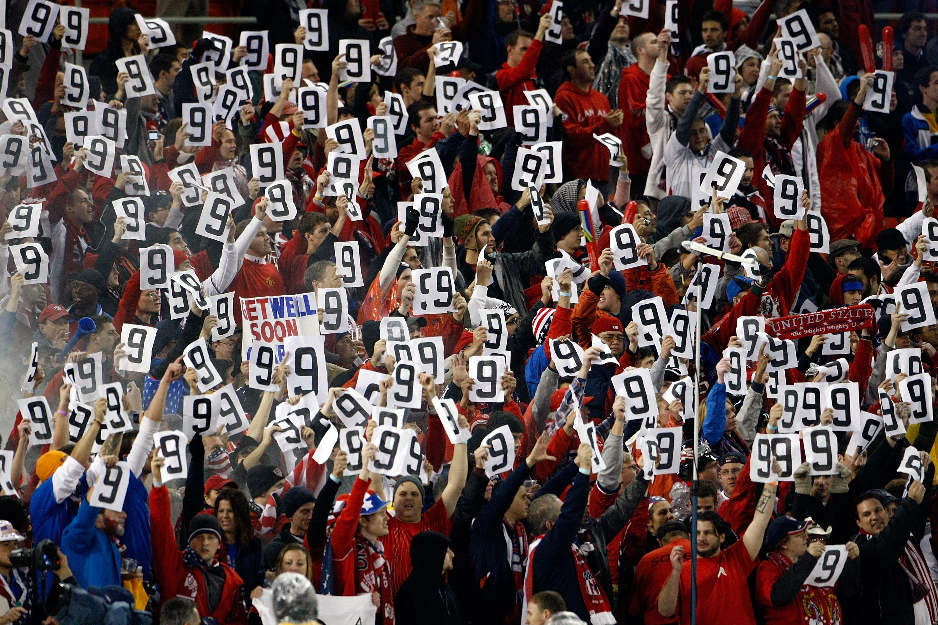 WASHINGTON - OCTOBER 14:  U.S. fans hold up signs for Charlie Davies who was injured in a car accident yesterday during the first half of a match against Costa Rica in the FIFA 2010 World Cup Qualifier at RFK stadium on October 14, 2009 in Washington, DC.