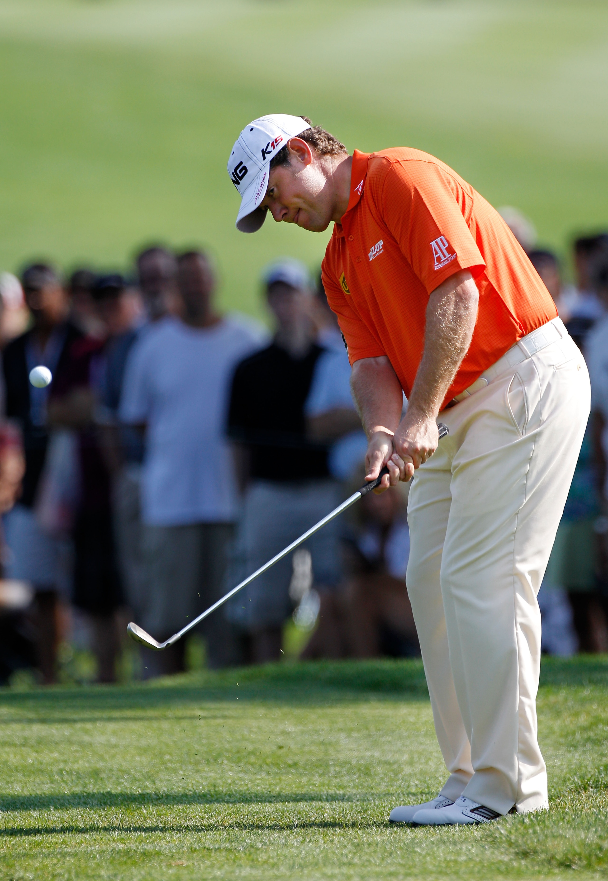 AKRON, OH - AUGUST 06:  Lee Westwood of England chips to the green on the tenth hole during the second round of the World Golf Championships - Bridgestone Invitational on the South Course at Firestone Country Club on August 6, 2010 in Akron, Ohio.  (Photo