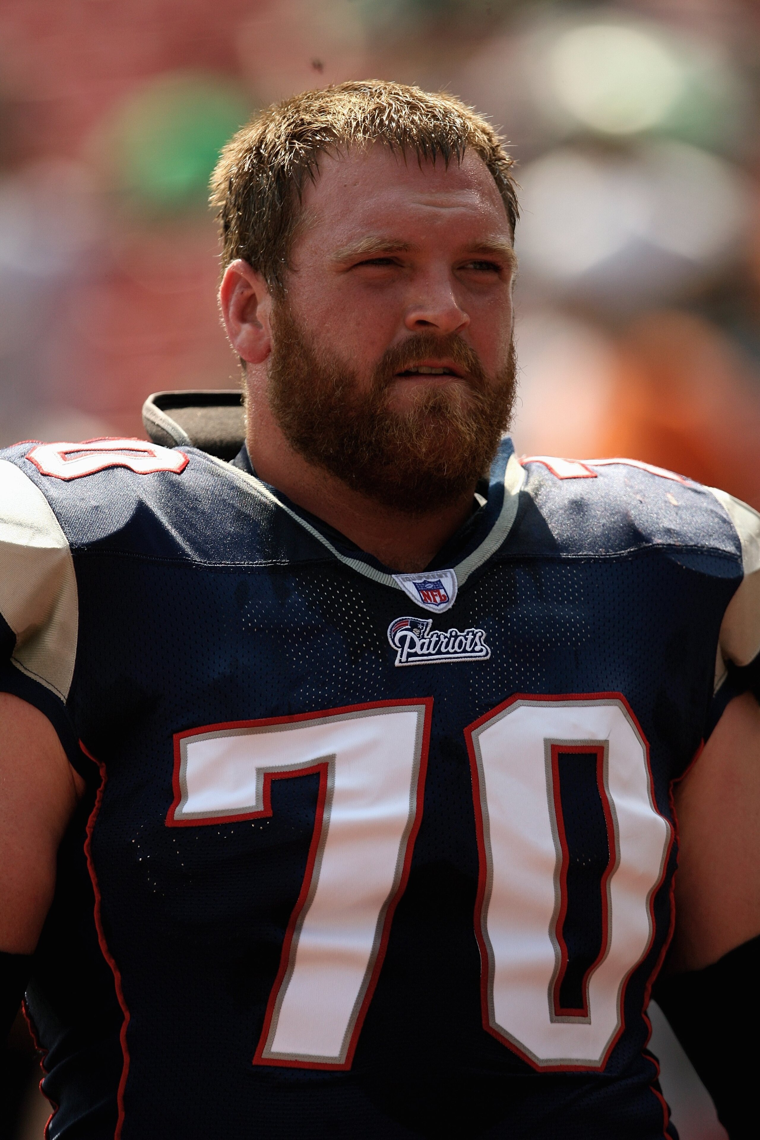 EAST RUTHERFORD, NJ - SEPTEMBER 09: Logan Mankins #70 of the New England Patriots stands on the sideline against the New York Jets during the NFL game on September 9, 2007 at Giants Stadium in East Rutherford, New Jersey. The Patriots defeated the Jets 38