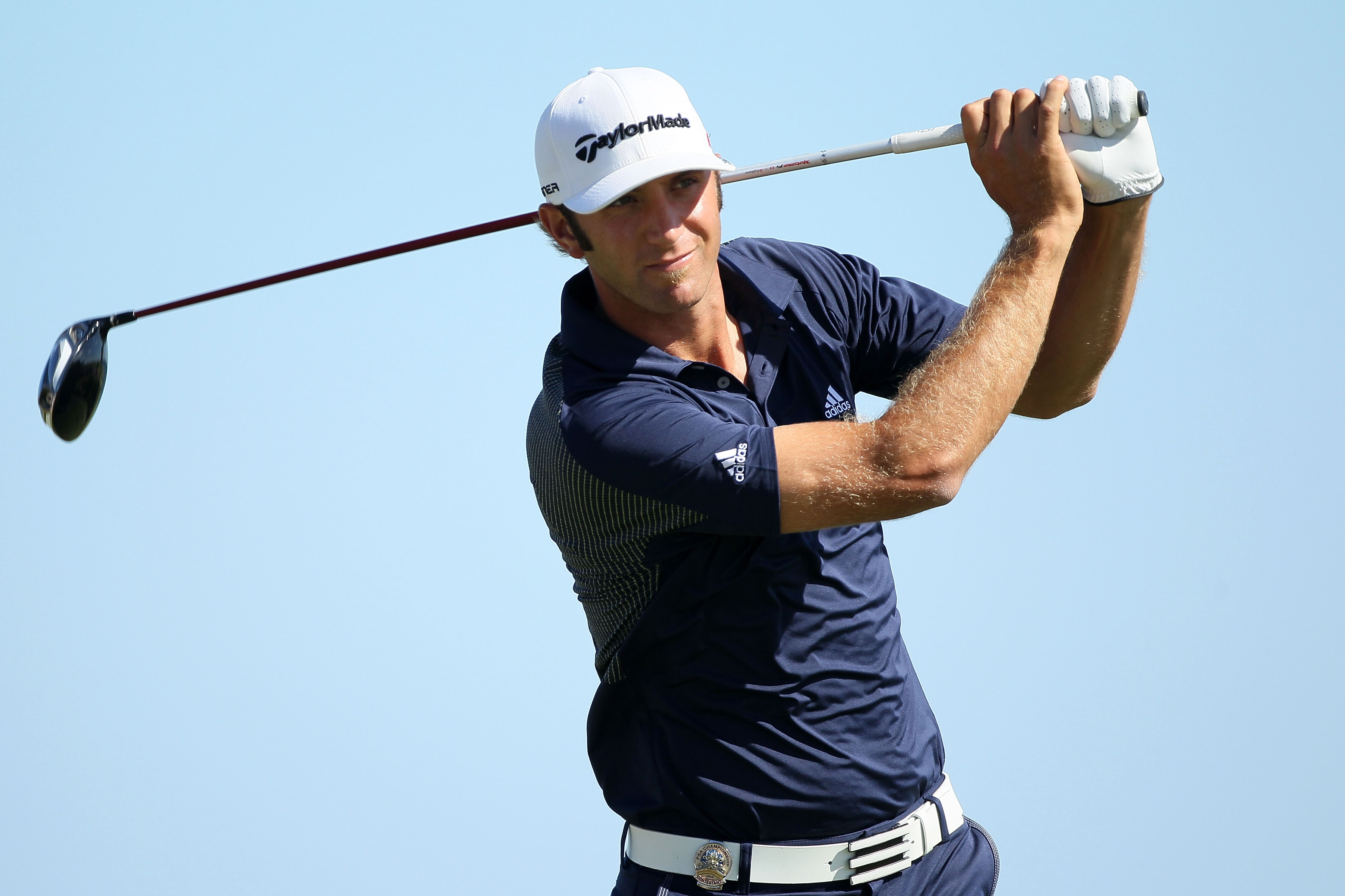KOHLER, WI - AUGUST 15:  Dustin Johnson watches his tee shot on the ninth hole during the final round of the 92nd PGA Championship on the Straits Course at Whistling Straits on August 15, 2010 in Kohler, Wisconsin.  (Photo by Andy Lyons/Getty Images)