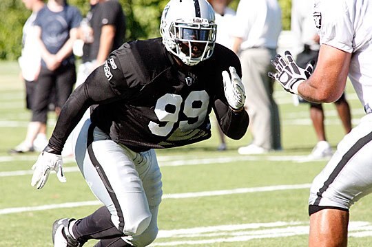 Lamarr Houston rushes the passer in minicamp.
