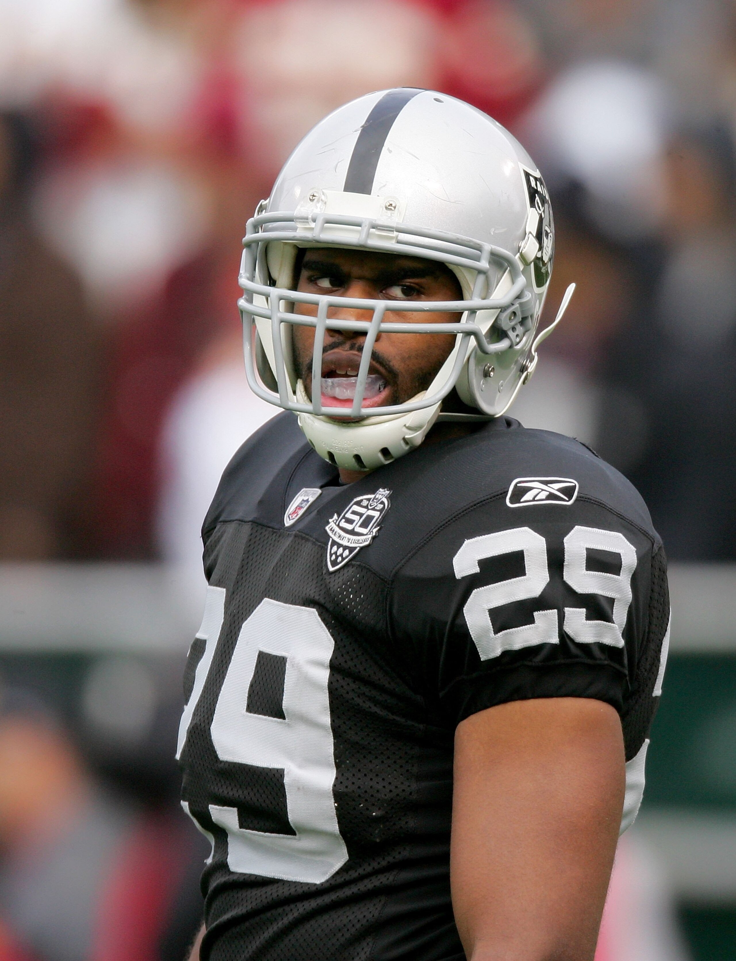 OAKLAND, CA - DECEMBER 13:  Michael Bush #29 of the Oakland Raiders stands on the field during their game against the Washington Redskins at Oakland-Alameda County Coliseum on December 13, 2009 in Oakland, California.  (Photo by Ezra Shaw/Getty Images)