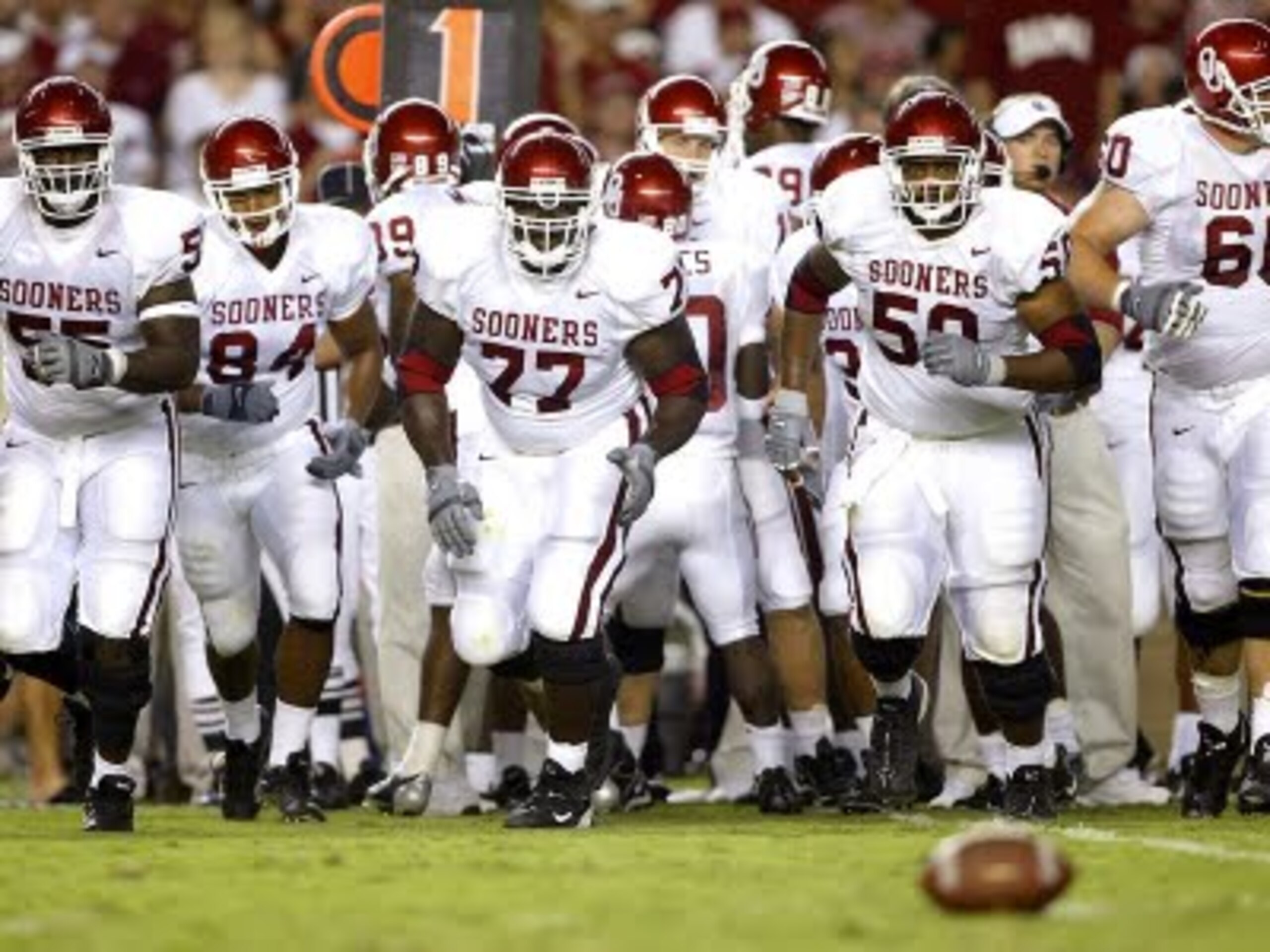 11 Nov 2001:  Offensive lineman Mike Skinner #71of Oklahoma puts a block on Harold Robertson #41 of Texas A&M in the second quarter at Memorial Stadium in Norman, Oklahoma.  DIGITAL IMAGE Mandatory Credit: Ronald Martinez/ALLSPORT