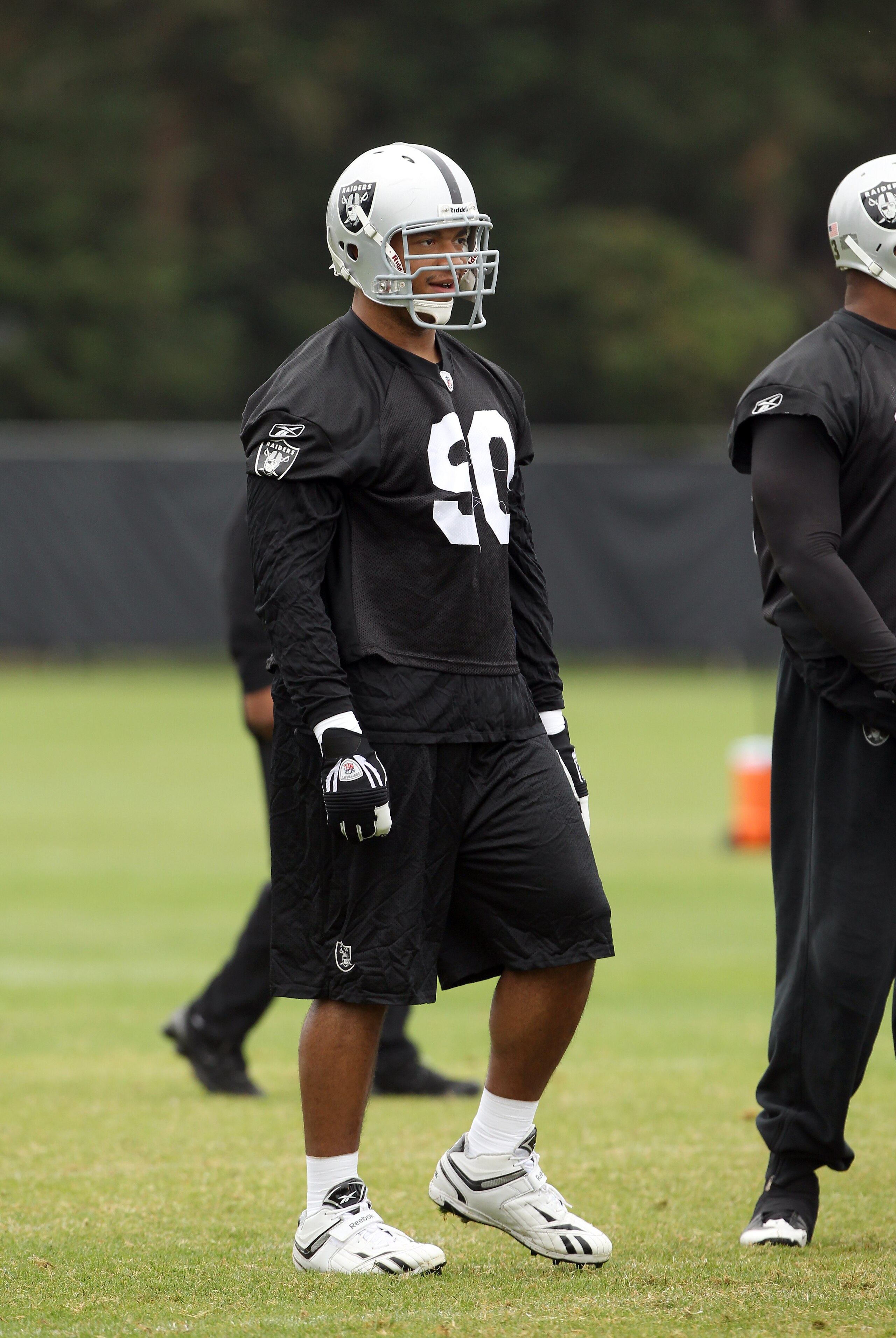 NAPA, CA - AUGUST 01:  Desmond Bryant #90 of the Oakland Raiders works out during the Raiders training camp at their Napa Valley Training Complex on August 1, 2010 in Napa, California.  (Photo by Ezra Shaw/Getty Images)