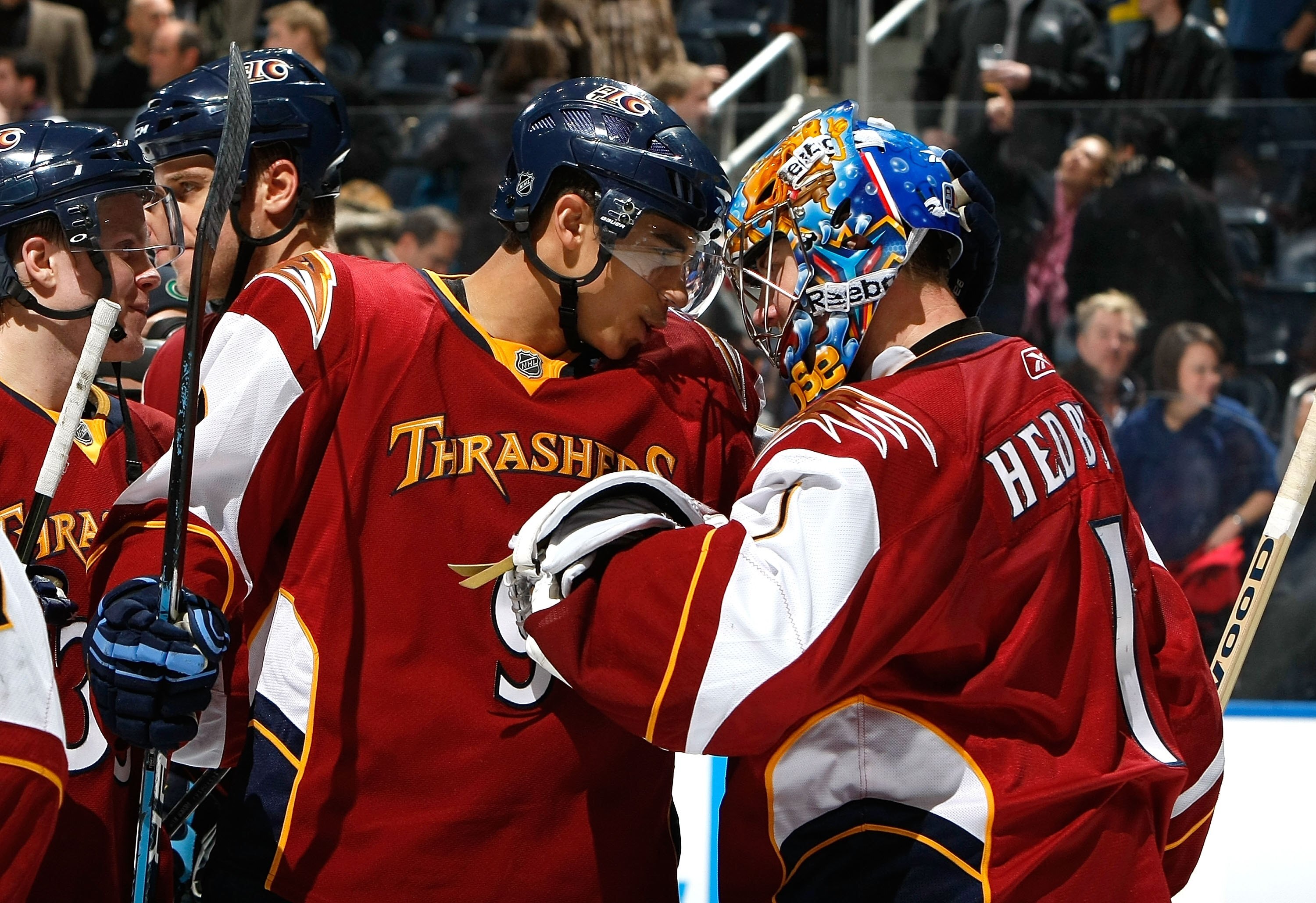 ATLANTA - JANUARY 07:  Goaltender Johan Hedberg #1 and Evander Kane #9 of the Atlanta Thrashers against the New York Rangers at Philips Arena on January 7, 2010 in Atlanta, Georgia.  (Photo by Kevin C. Cox/Getty Images)