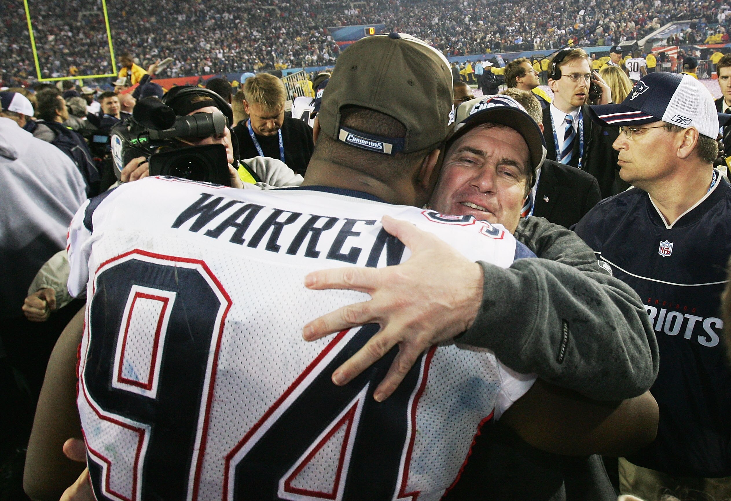 JACKSONVILLE, FL - FEBRUARY 6:  Head coach Bill Belichick of the New England Patriots celebrates with defensive lineman Ty Warren #94 on the field after defeating the Philadelphia Eagles in Super Bowl XXXIX at Alltel Stadium on February 6, 2005 in Jackson