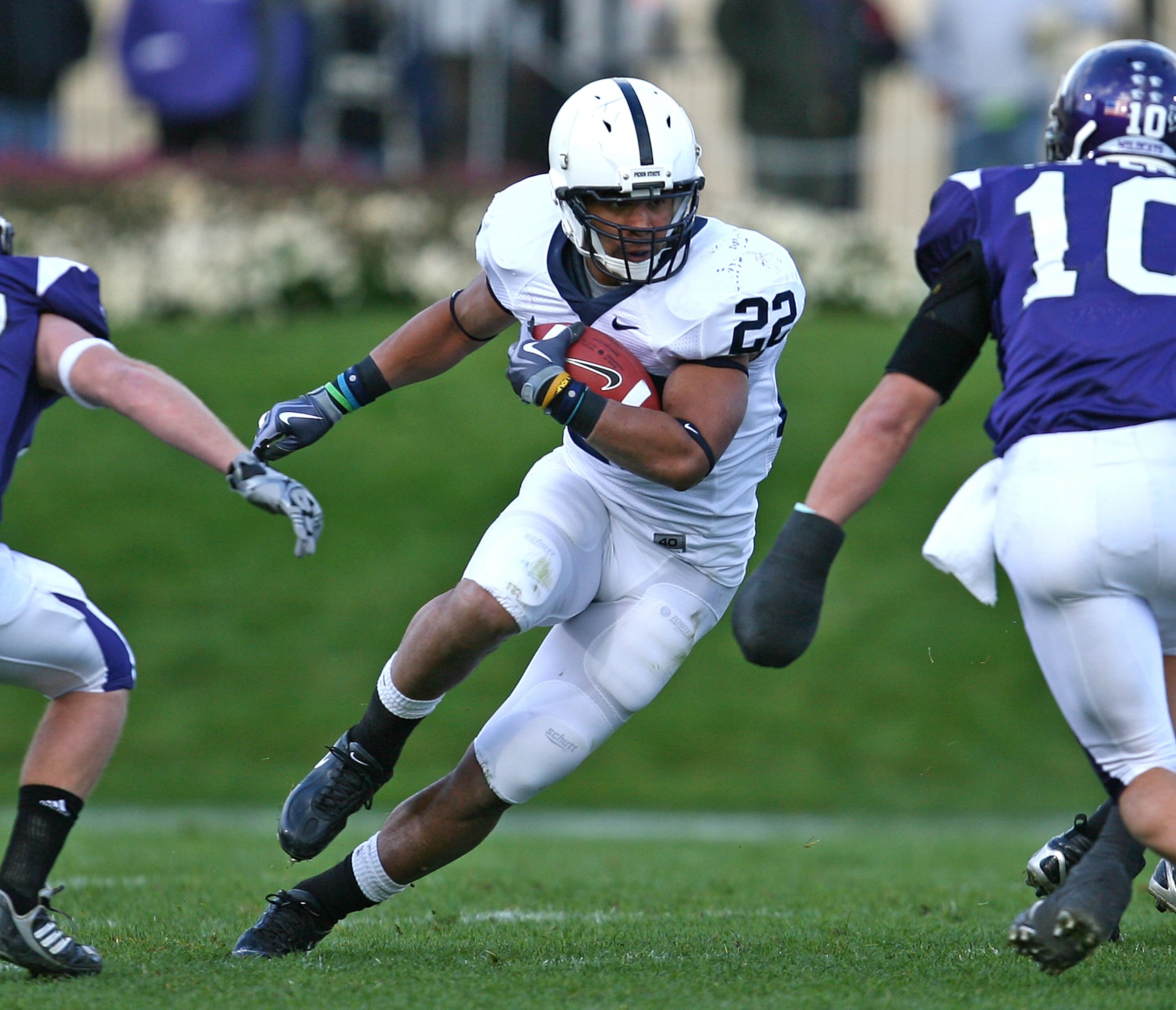 EVANSTON, IL - OCTOBER 31: Evan Royster #22 of the Penn State Nittany Lions runs against the Northwestern Wildcats at Ryan Field on October 31, 2009 in Evanston, Illinois. (Photo by Jonathan Daniel/Getty Images)