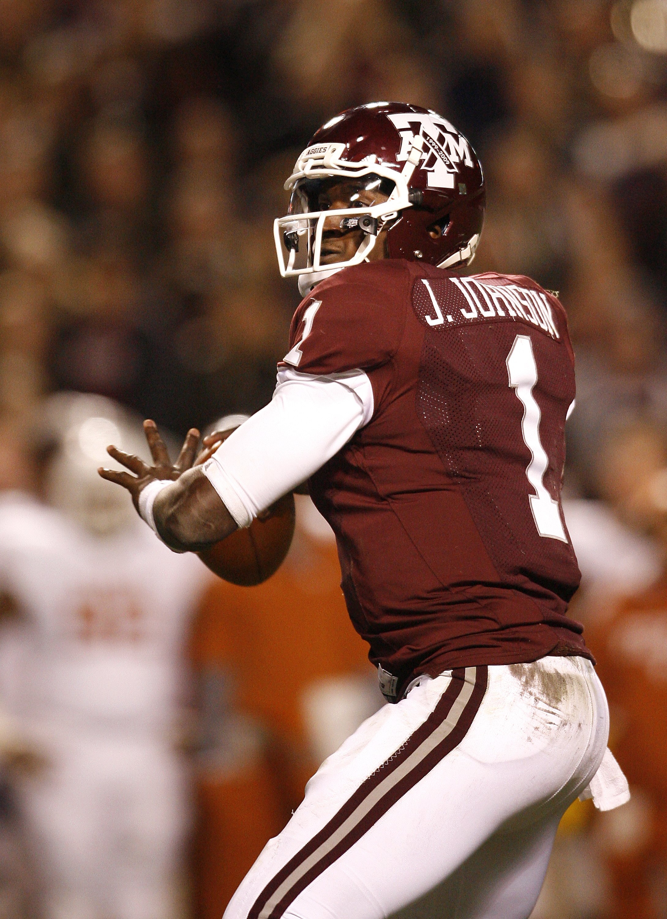 COLLEGE STATION, TX - NOVEMBER 26: Quarterback Jerrod Johnson #1 of the Texas A&M Aggies looks to throw the ball downfield to an open receiver against the Texas Longhorns in the second half at Kyle Field on November 26, 2009 in College Station, Texas. The