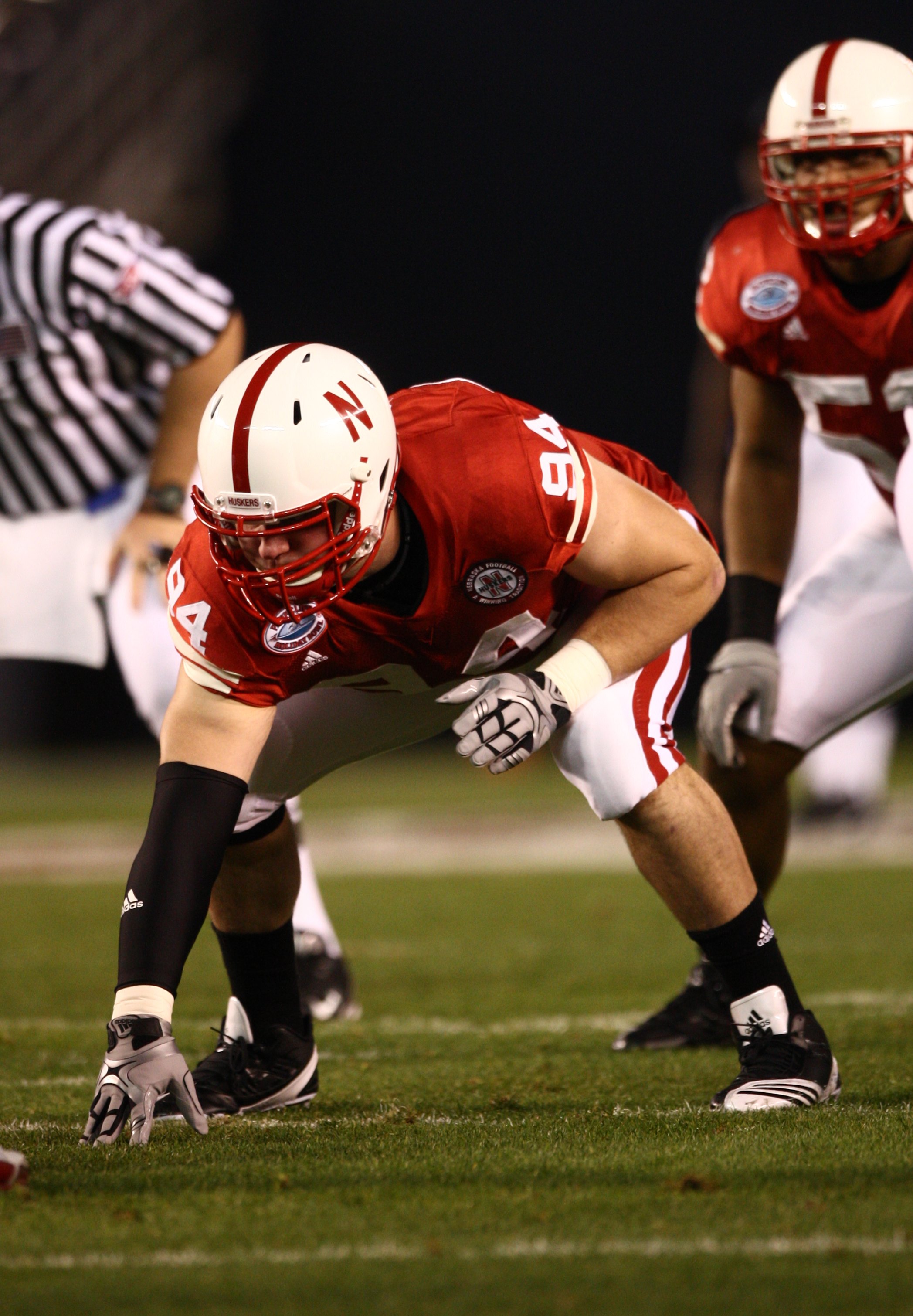 SAN DIEGO - DECEMBER 30:  Jared Crick #94 of the University of Nebraska Cornhuskers lines up in position during the Pacific Life Holiday Bowl against University of Arizona Wildcats on December 30, 2009 at Qualcomm Stadium in San Diego, California. The Cor