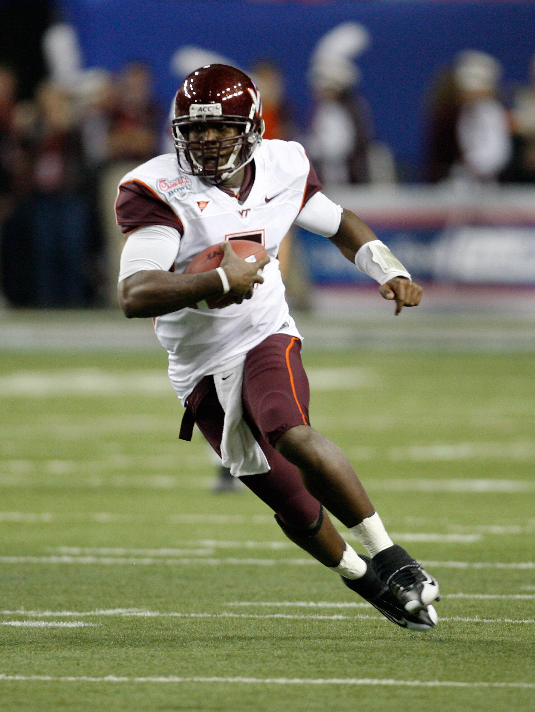 ATLANTA - DECEMBER 31:  Quarterback Tyrod Taylor #5 of the Virginia Tech Hokies runs with the ball during the Chick-Fil-A Bowl against the Tennessee Volunteers at the Georgia Dome on December 31, 2009 in Atlanta, Georgia.  The Hokies beat the Volunteers 3