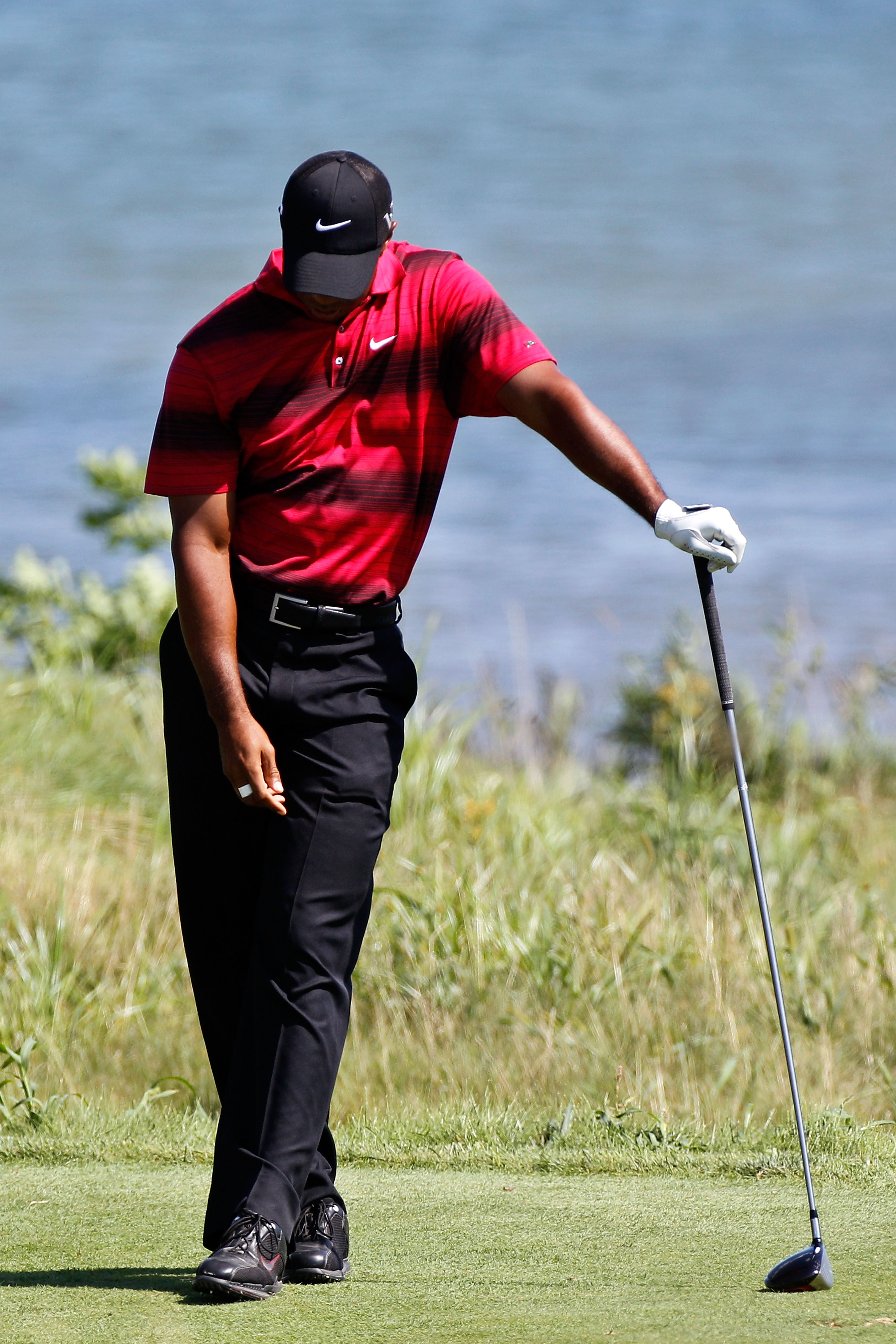 KOHLER, WI - AUGUST 15: Tiger Woods reacts to a shot on the 18th hole during the final round of the 92nd PGA Championship on the Straits Course at Whistling Straits on August 15, 2010 in Kohler, Wisconsin. (Photo by Sam Greenwood/Getty Images)