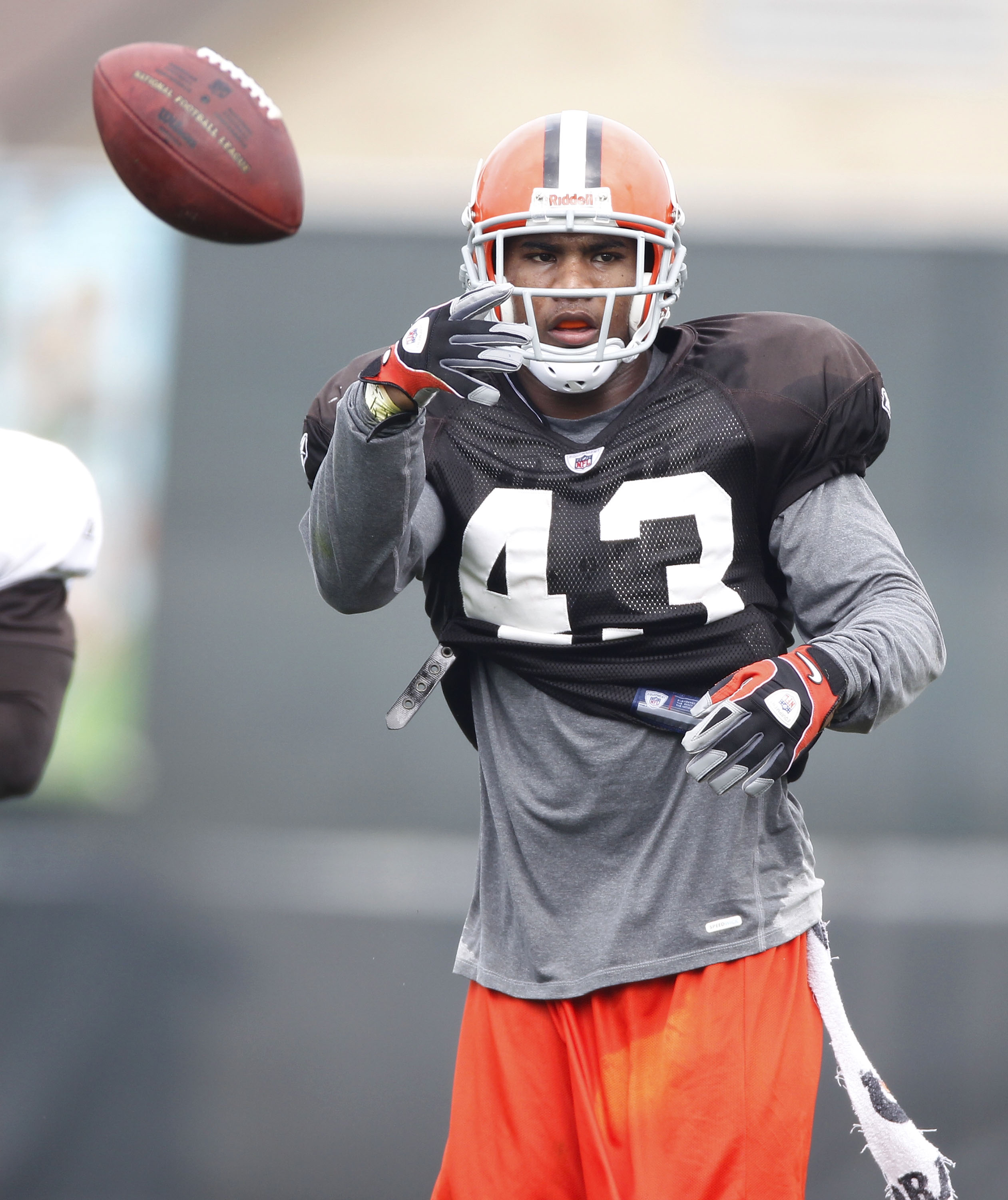 BEREA, OH - AUGUST 04:  T.J. Ward #43 of the Cleveland Browns flips the ball after a drill during training camp at the Cleveland Browns Training and Administrative Complex on August 4, 2010 in Berea, Ohio.  (Photo by Gregory Shamus/Getty Images)